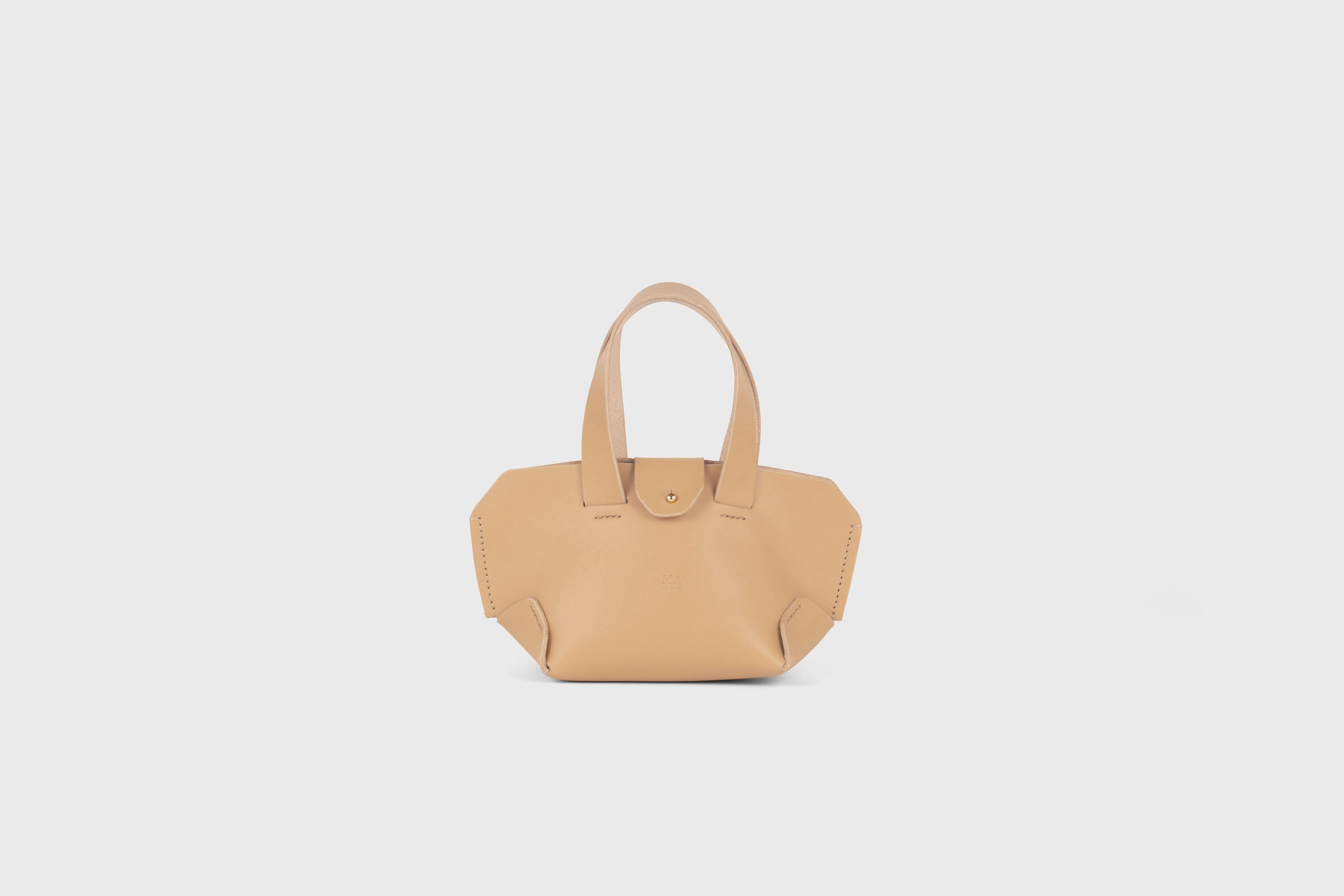 Nano Tote Bag In Natural Color In Vegetable Tanned Leather Minimalistic Design Atelier Madre Manuel Dreesmann Barcelona Spain