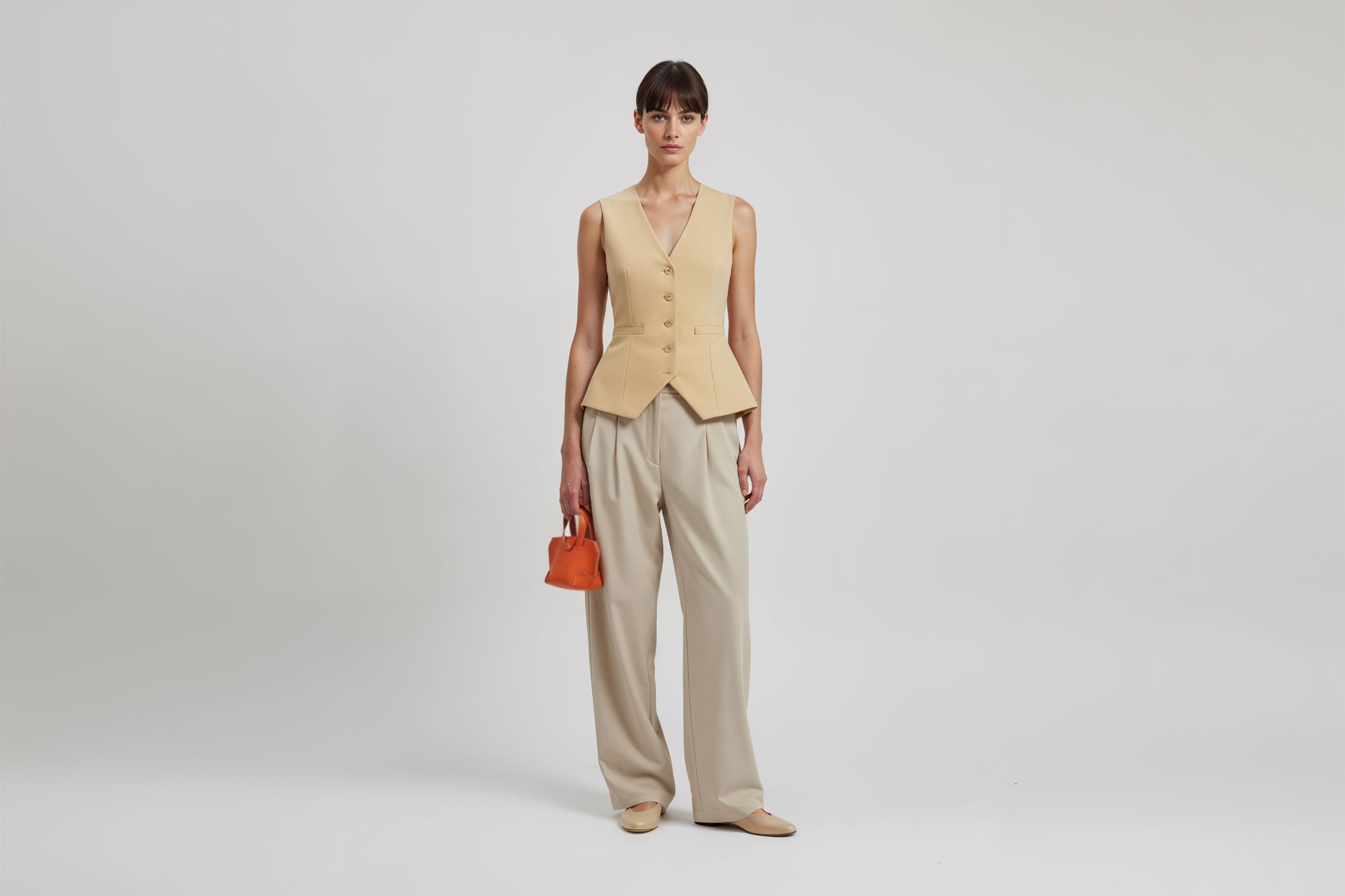 Nano Leather Tote Bag Orange Color On A Woman Model Premium Quality Minimalist Design Atelier Madre Manuel Dreesmann Barcelona Spain