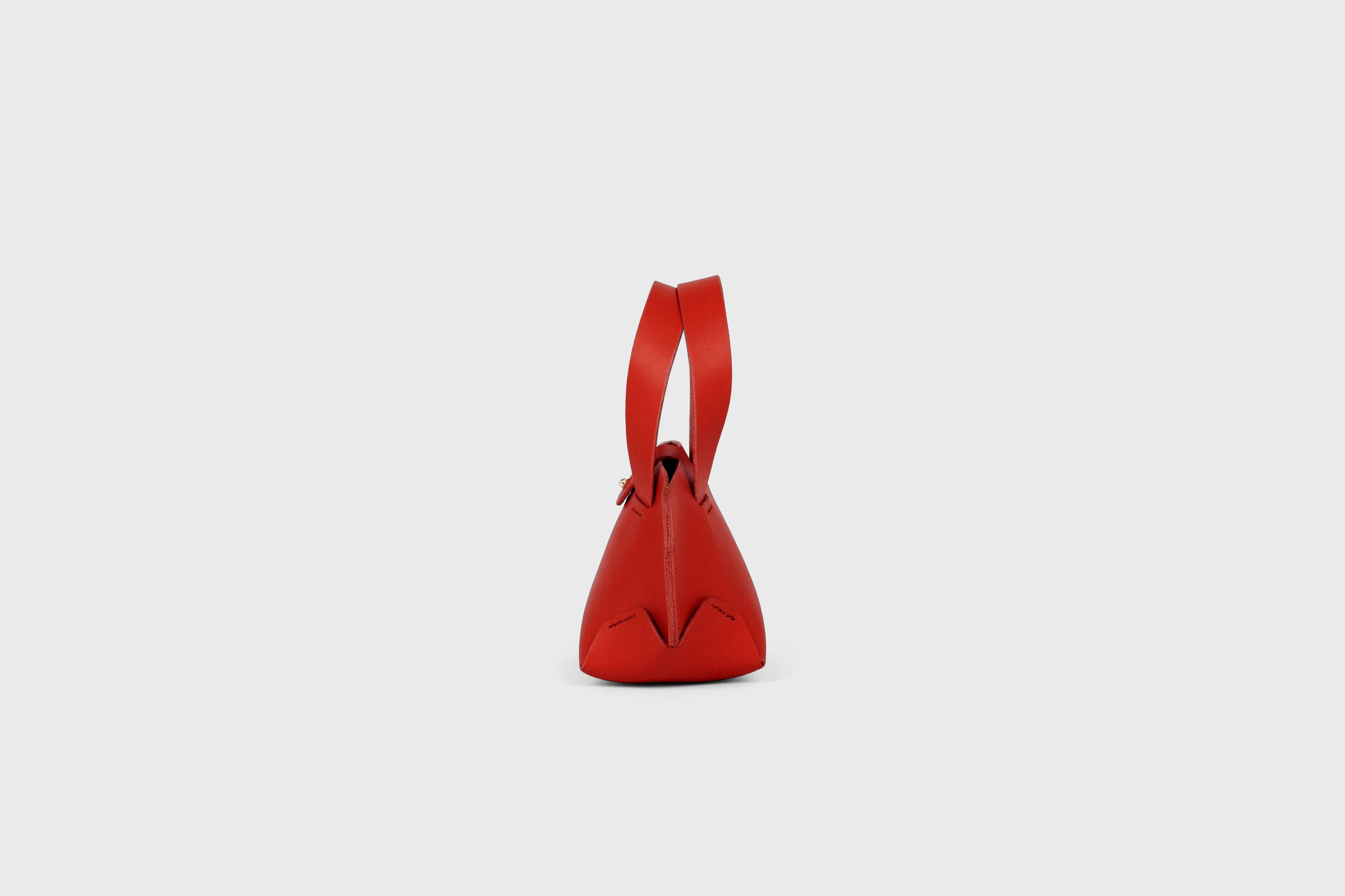 Nano Tote Bag In Red Color In Vegetable Tanned Leather Minimalistic Design Atelier Madre Manuel Dreesmann Barcelona Spain
