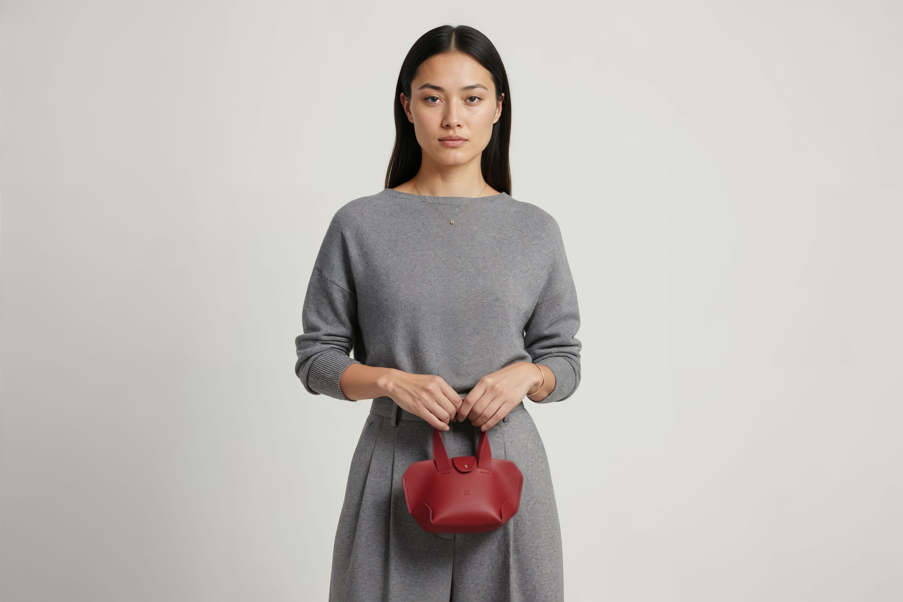 Nano Leather Tote Bag Red Color On A Woman Model Premium Quality Minimalist Design Atelier Madre Manuel Dreesmann Barcelona Spain