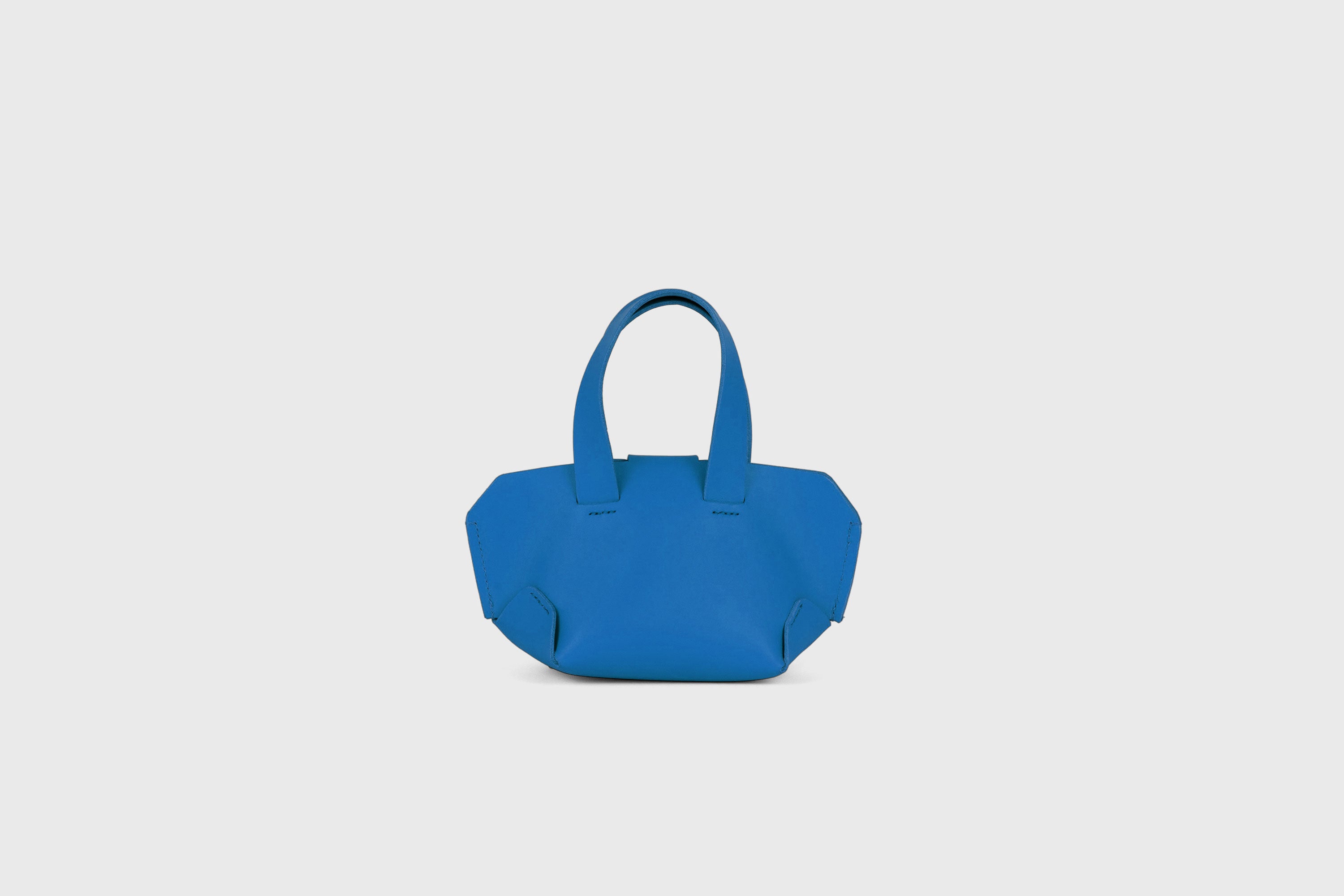Nano Tote Bag In Royal Blue Color In Vegetable Tanned Leather Minimalistic Design Atelier Madre Manuel Dreesmann Barcelona Spain