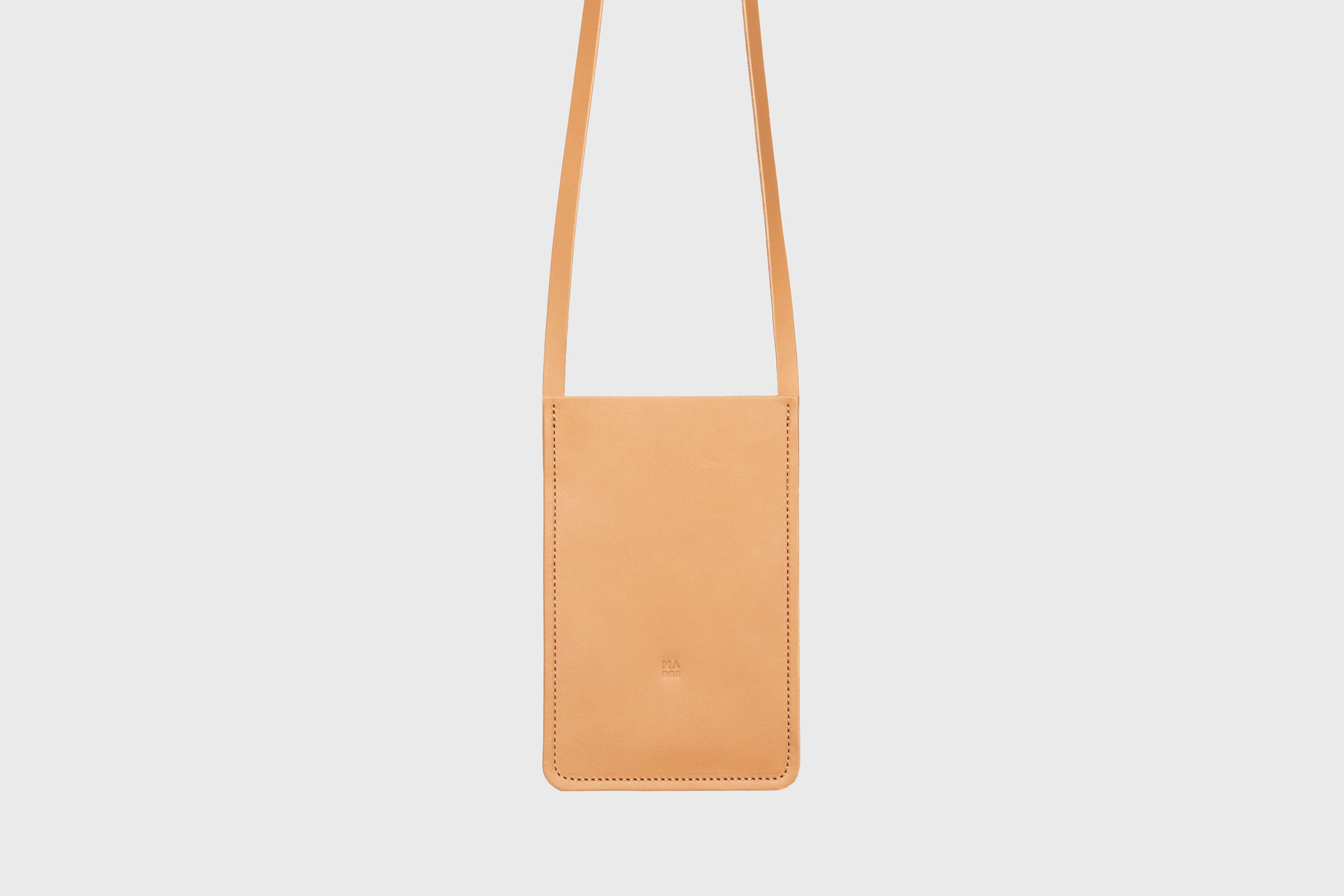 Neck Pouch Leather In Brown Color Vegetable Tanned Leather Minimalistic Design Atelier Madre Manuel Dreesmann Barcelona Spain