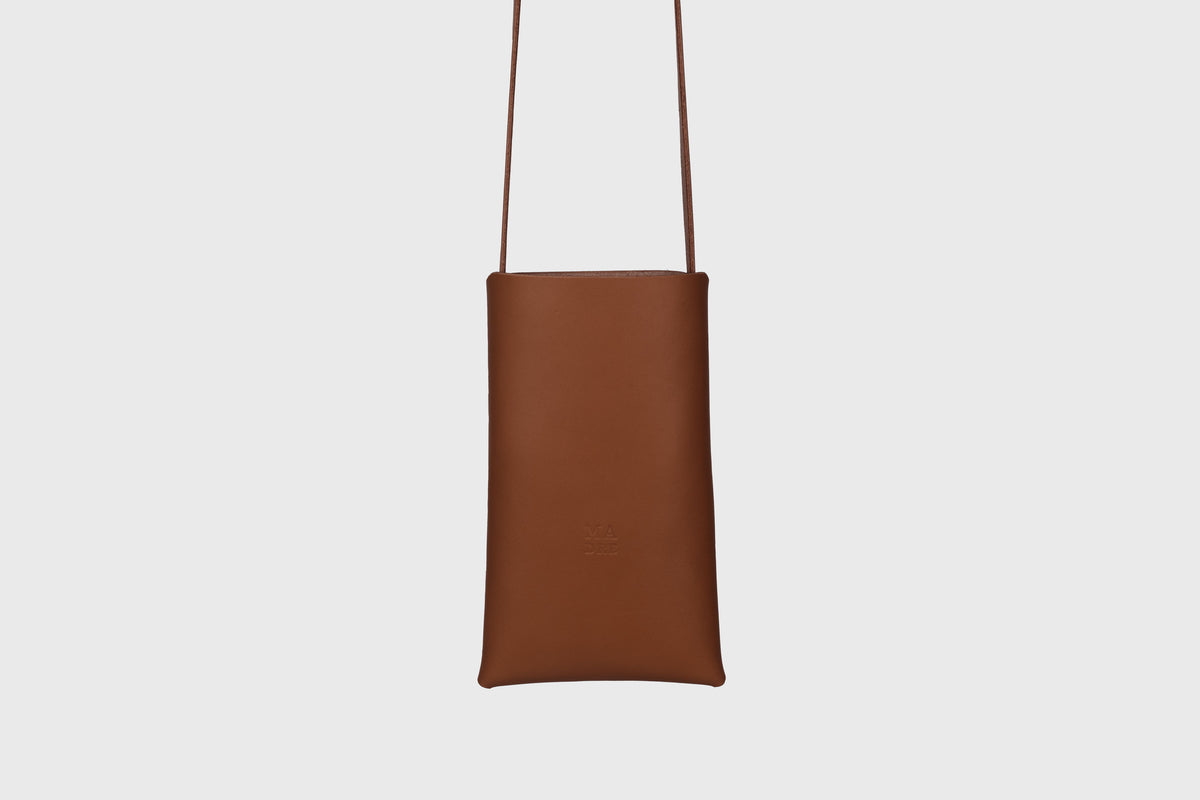 Neck pouch wide dark brown leather atelier madre manuel dreesmann barcelona spain 1