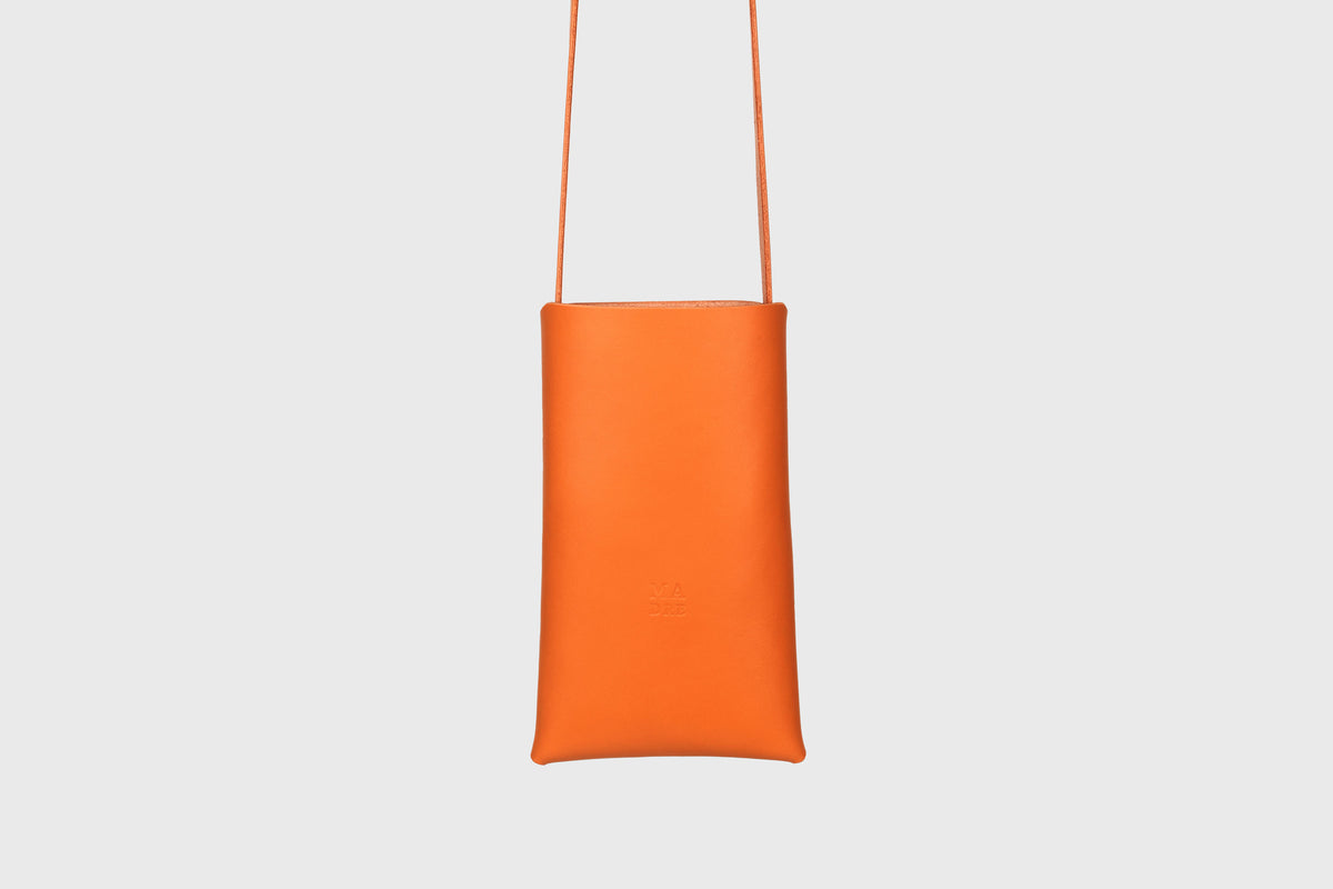 Neck pouch wide orange green leather atelier madre manuel dreesmann barcelona spain 1