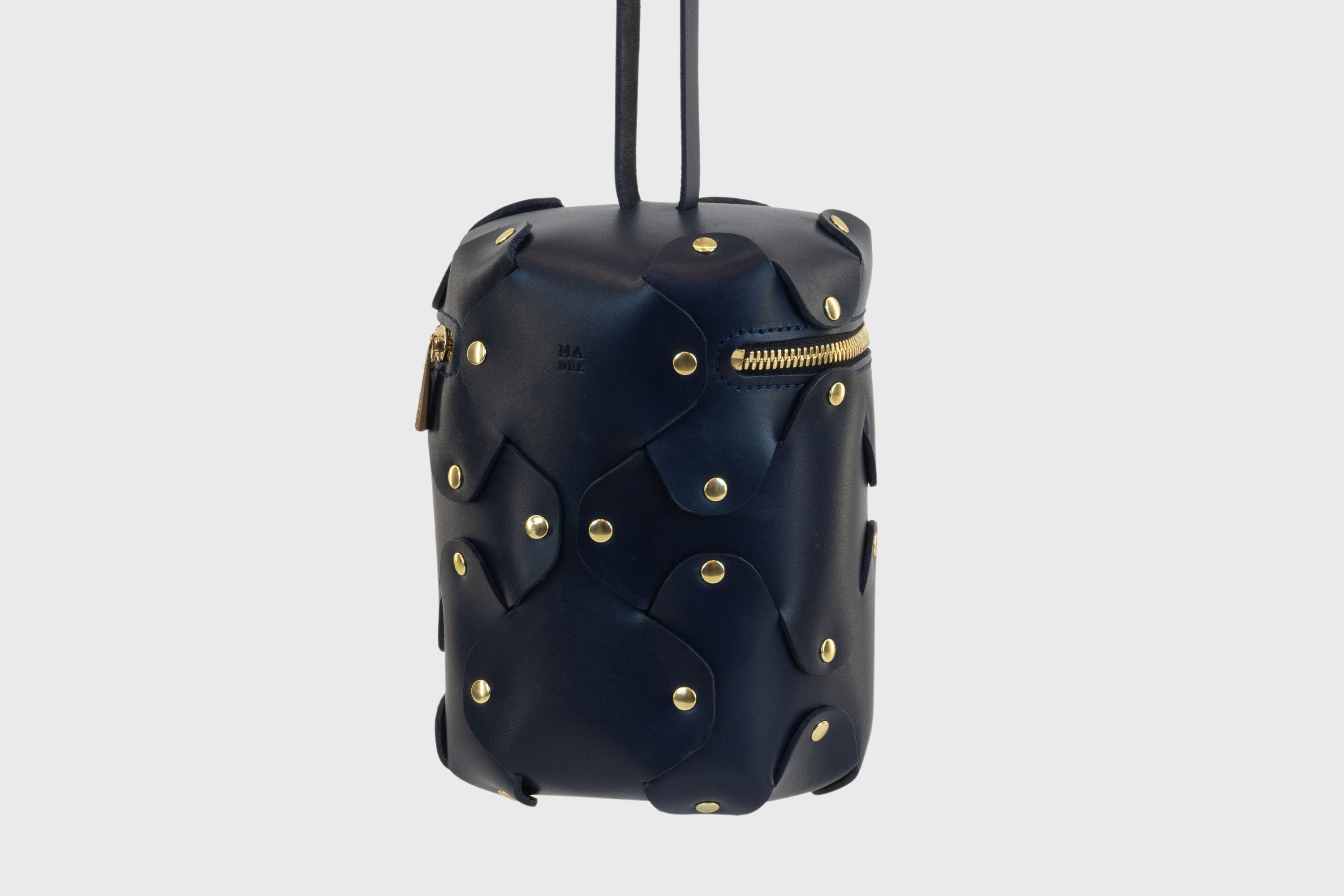 Nema Leather Bag Dark Marine Blue Color Vegetable Tanned Full Grain Spain Brass Rivets Premium Design Minimalist Modern Cylinder Circle Round Zipper Pouch Handbag Clutch Bag Atelier Madre Manuel Dreesmann Barcelona