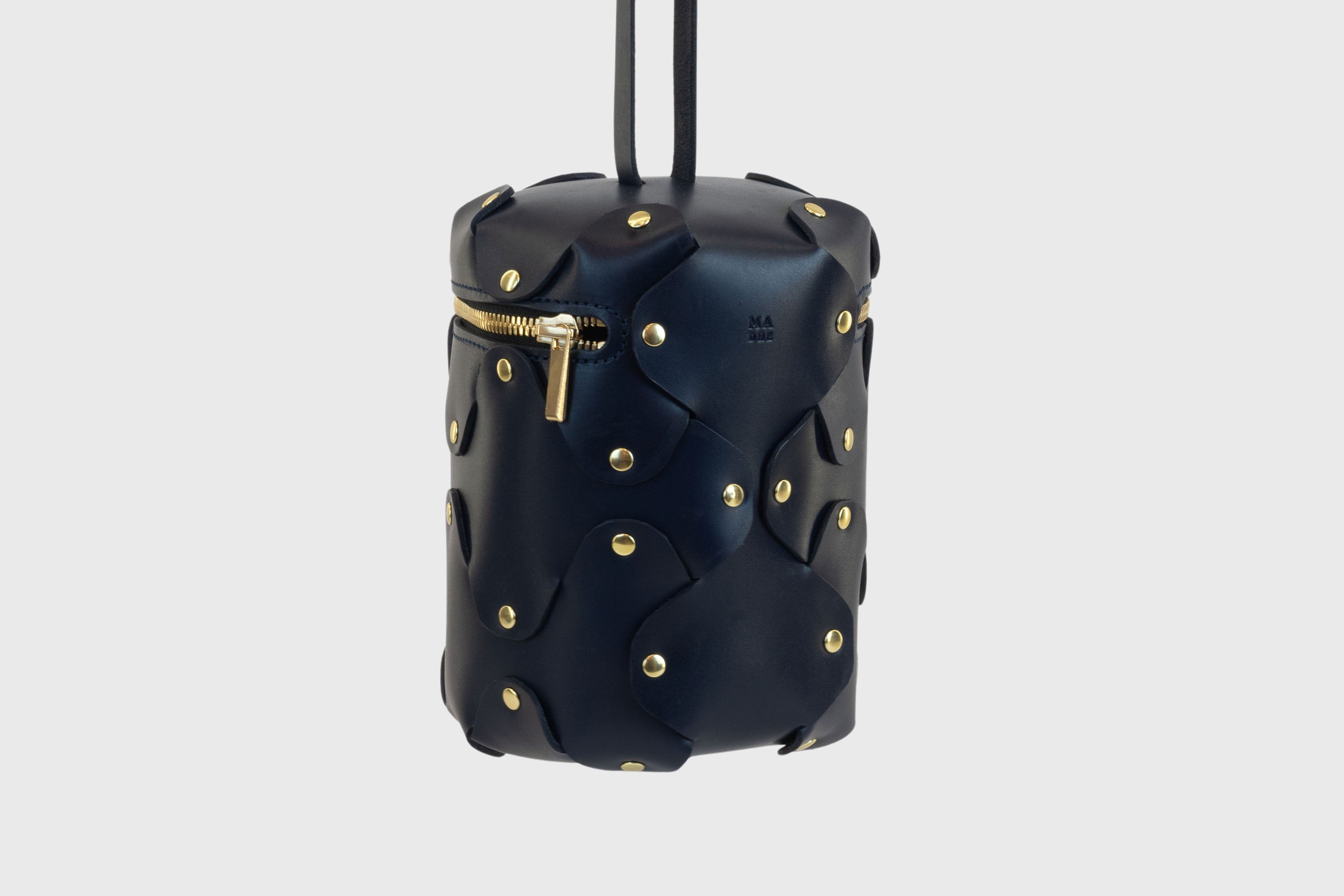 Nema Leather Bag Dark Marine Blue Color Vegetable Tanned Full Grain Spain Brass Rivets Premium Design Minimalist Modern Cylinder Circle Round Zipper Pouch Handbag Clutch Bag Atelier Madre Manuel Dreesmann Barcelona