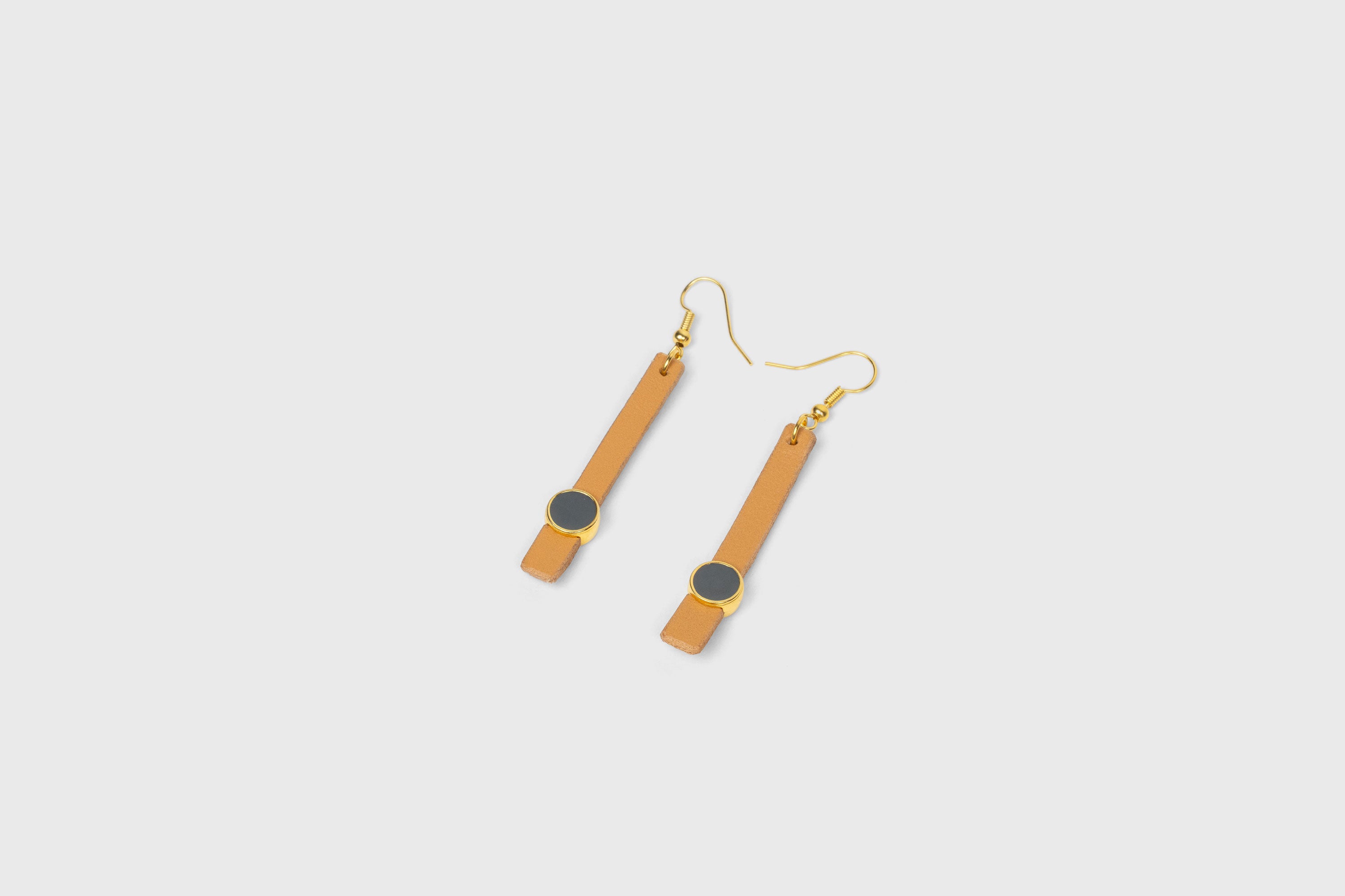 Nuria Earrings In Brown Color Vegetable Tanned Leather Gold Brass Hook Minimalistic Design Atelier Madre Manuel Dreesmann Barcelona Spain