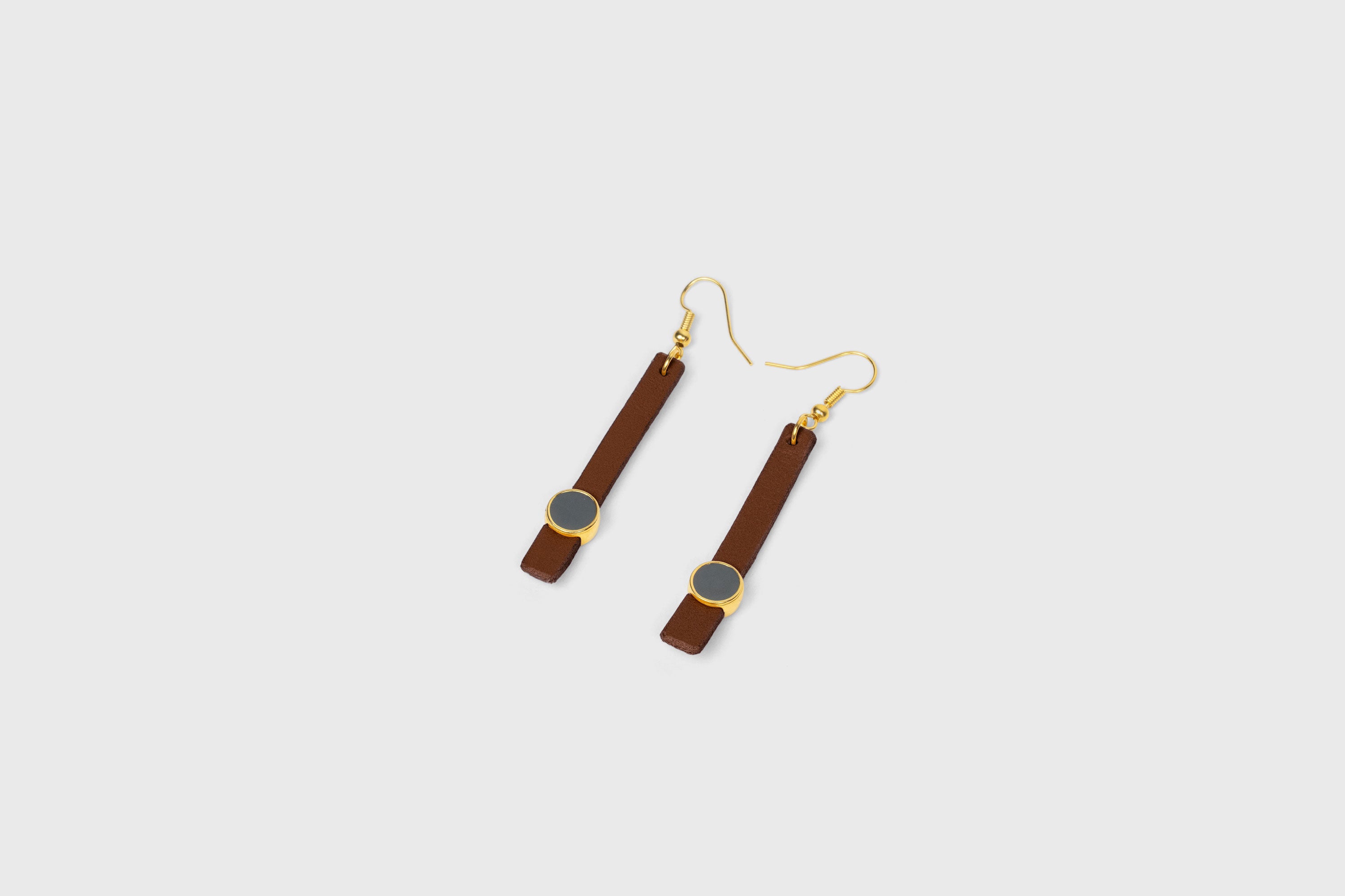 Nuria Earrings In Dark Brown Color Vegetable Tanned Leather Gold Brass Hook Minimalistic Design Atelier Madre Manuel Dreesmann Barcelona Spain