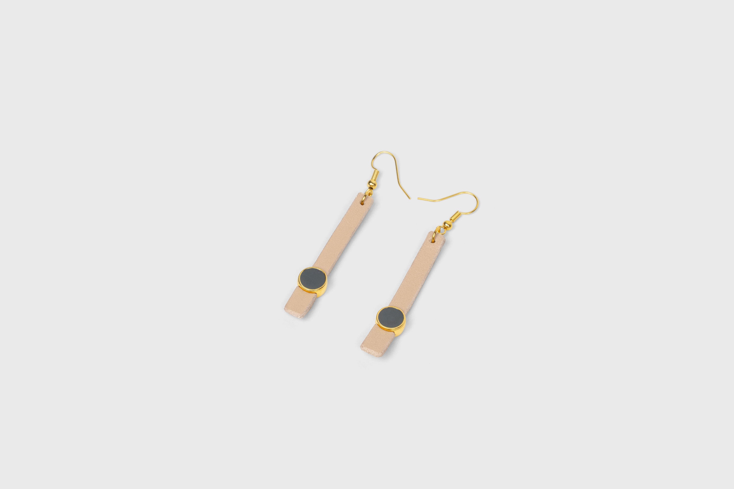 Nuria Earrings In Natural Color Vegetable Tanned Leather Gold Brass Hook Minimalistic Design Atelier Madre Manuel Dreesmann Barcelona Spain