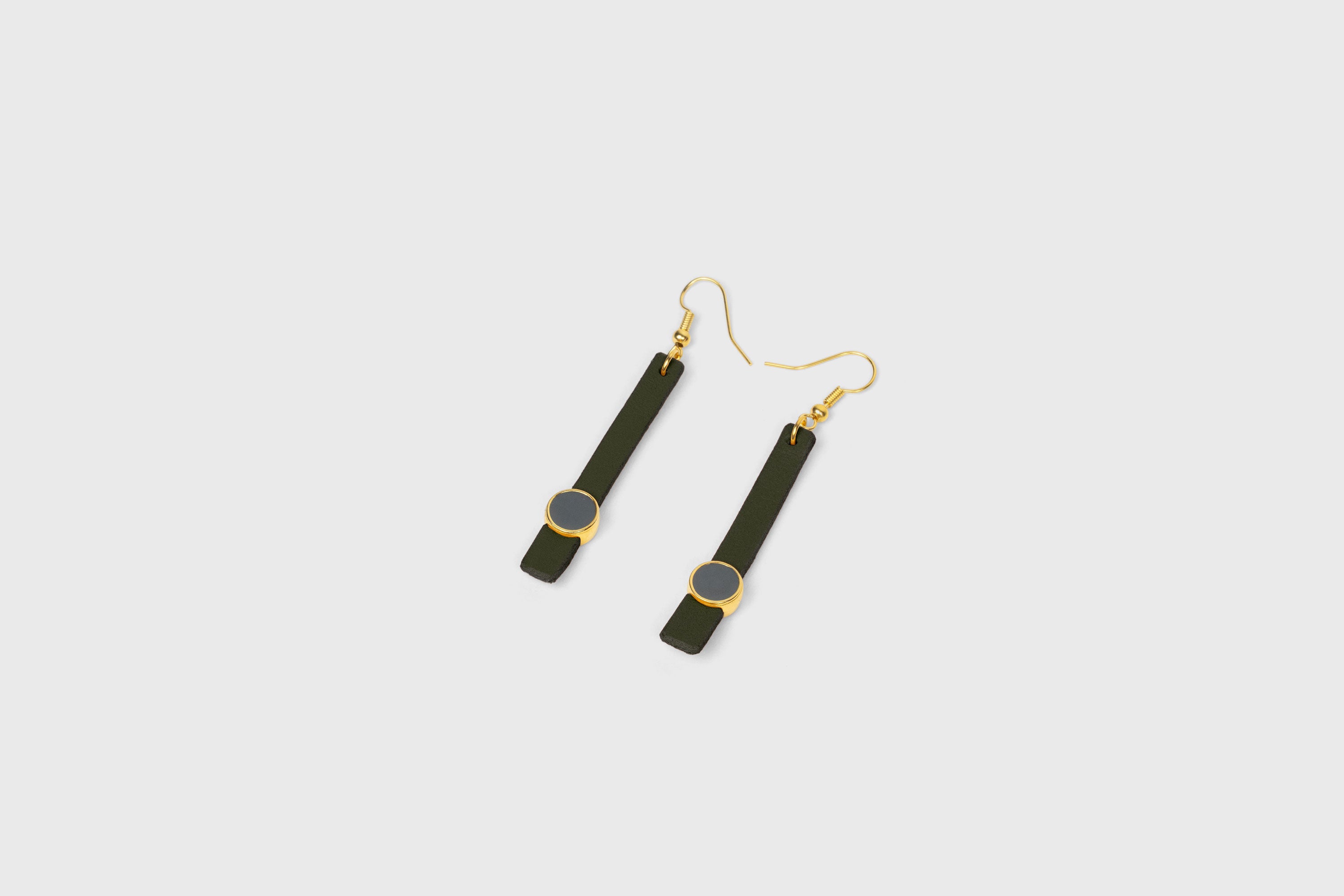 Nuria Earrings In Olive Green Color Vegetable Tanned Leather Gold Brass Hook Minimalistic Design Atelier Madre Manuel Dreesmann Barcelona Spain