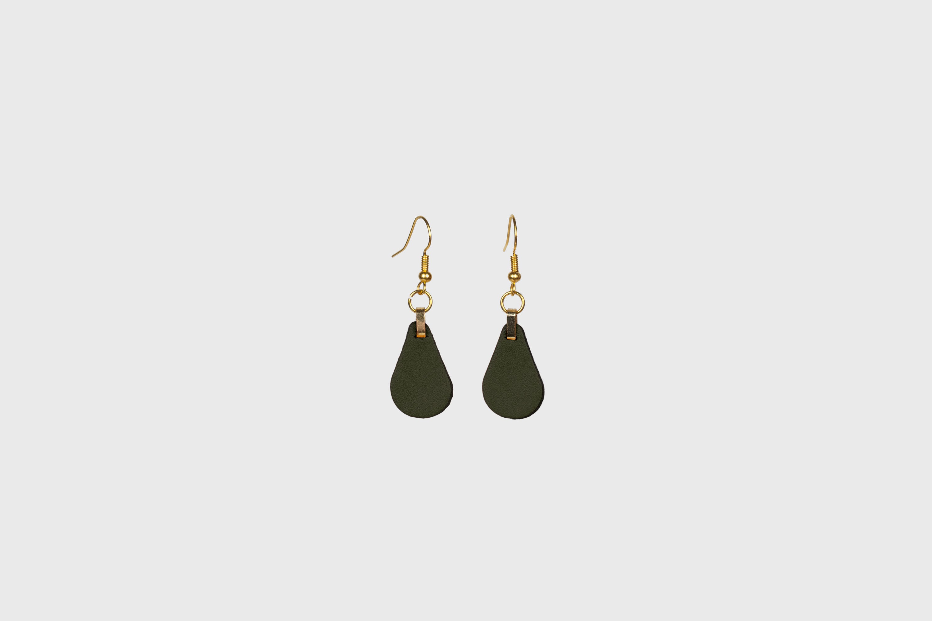 Ona Earrings In Olive Green Color In Vegetable Tanned Leather Minimalistic Design Atelier Madre Manuel Dreesmann Barcelona Spain