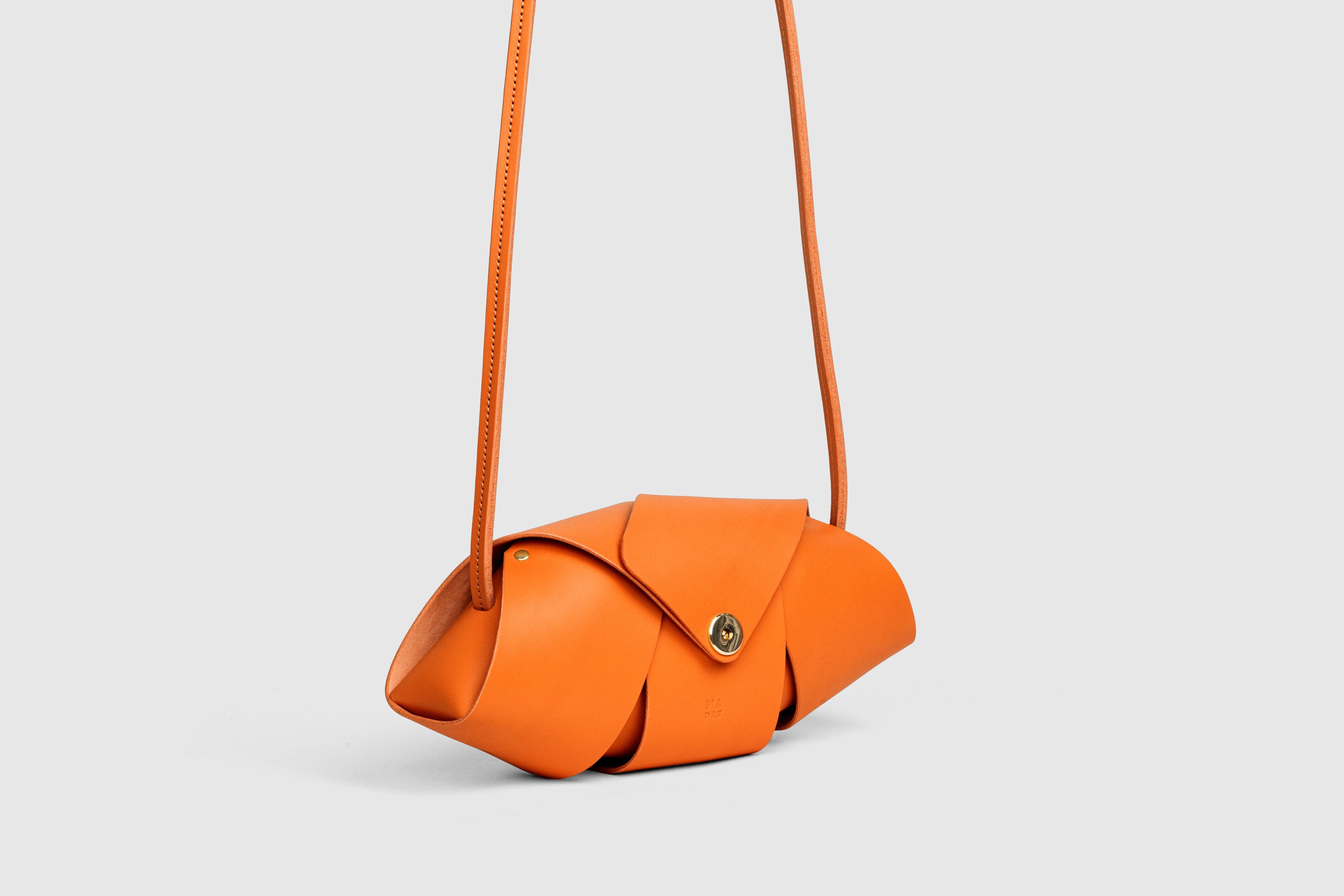 Panino Bag Orange Leather Magnetic Closure Full Grain Vegetable Tanned Leather High Quality Modern Minimalistic Design Atelier Madre Manuel Dreesmann Barcelona Spain