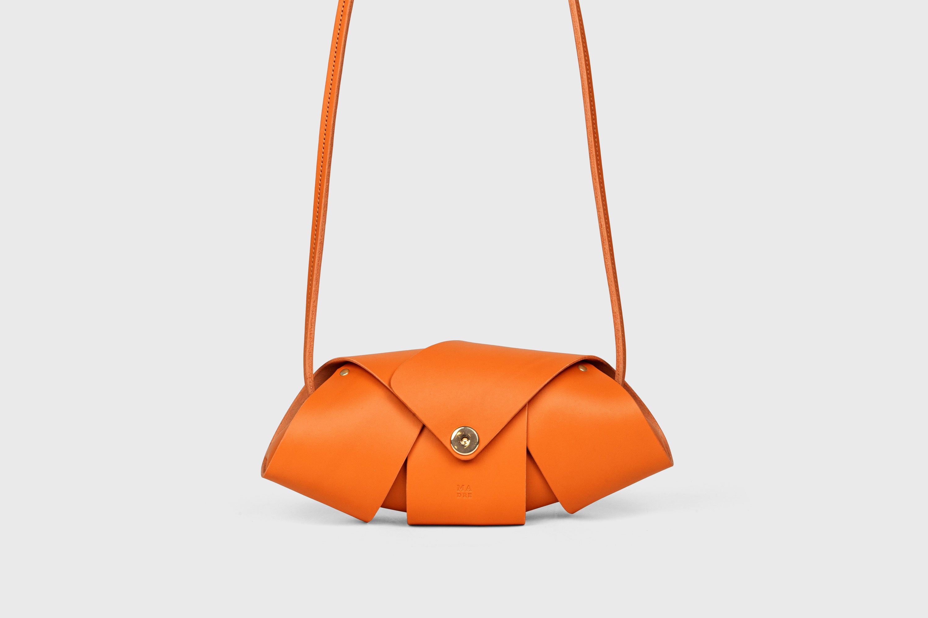 Panino Bag Orange Leather Magnetic Closure Full Grain Vegetable Tanned Leather High Quality Modern Minimalistic Design Atelier Madre Manuel Dreesmann Barcelona Spain