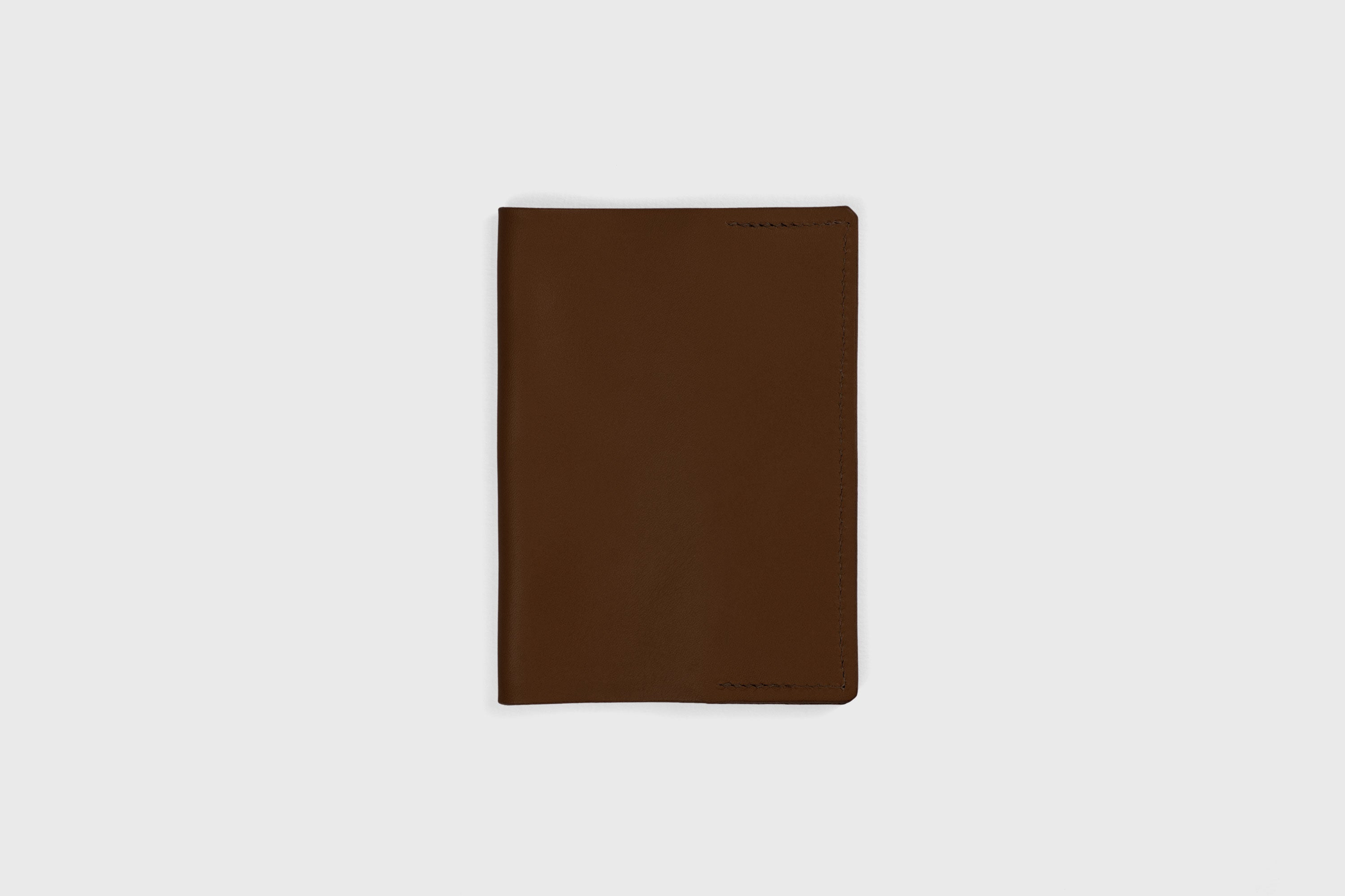 Passport Cover Holder Leather Dark Brown Color Leather Sleeve Case Minimalistic Design Modern Premium Quality Handcraft Vegetable Tanned Leather Manuel Dreesmann Atelier Madre Barcelona Spain
