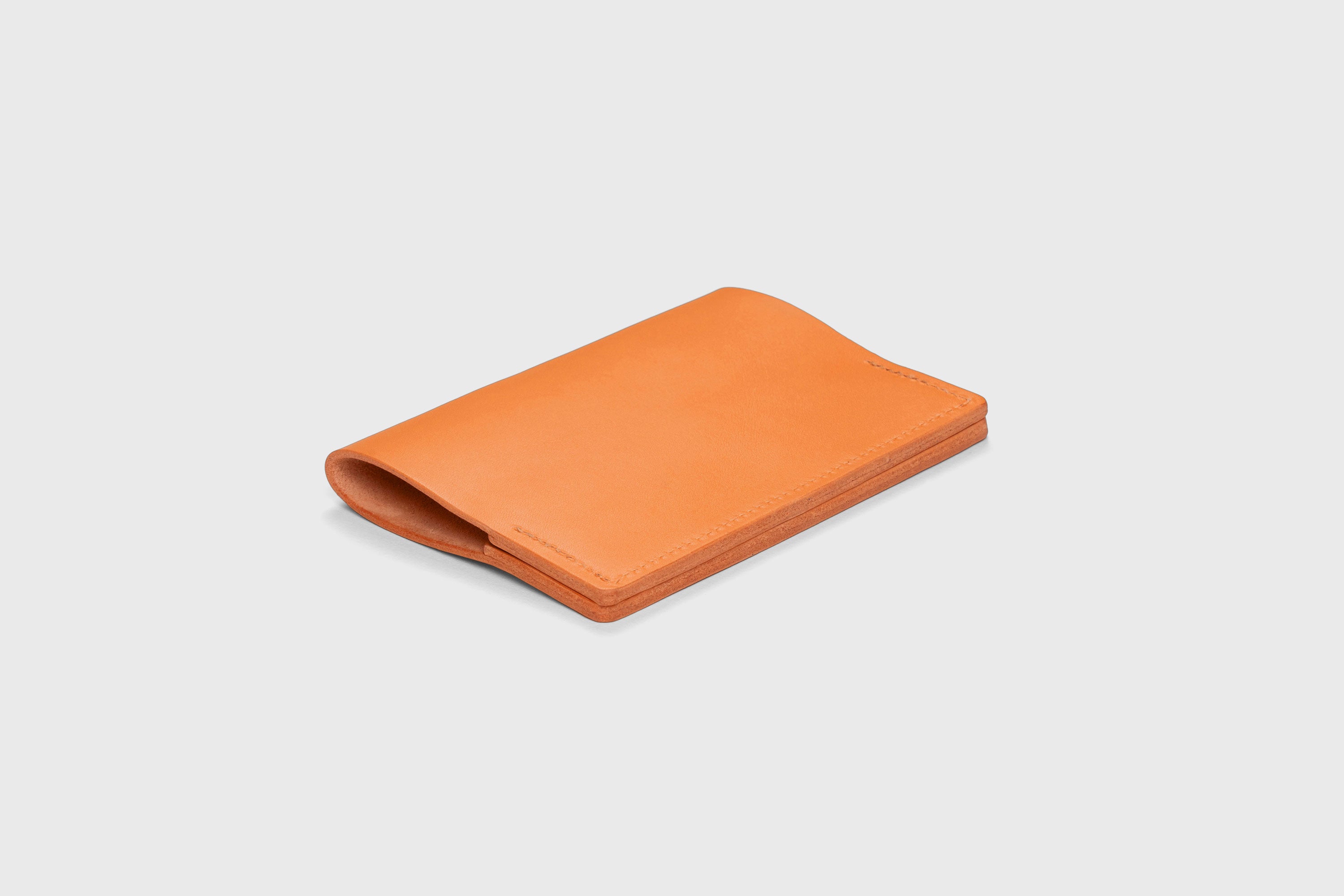 Passport Cover Holder Leather Orange Color Leather Sleeve Case Minimalistic Design Modern Premium Quality Handcraft Vegetable Tanned Leather Manuel Dreesmann Atelier Madre Barcelona Spain