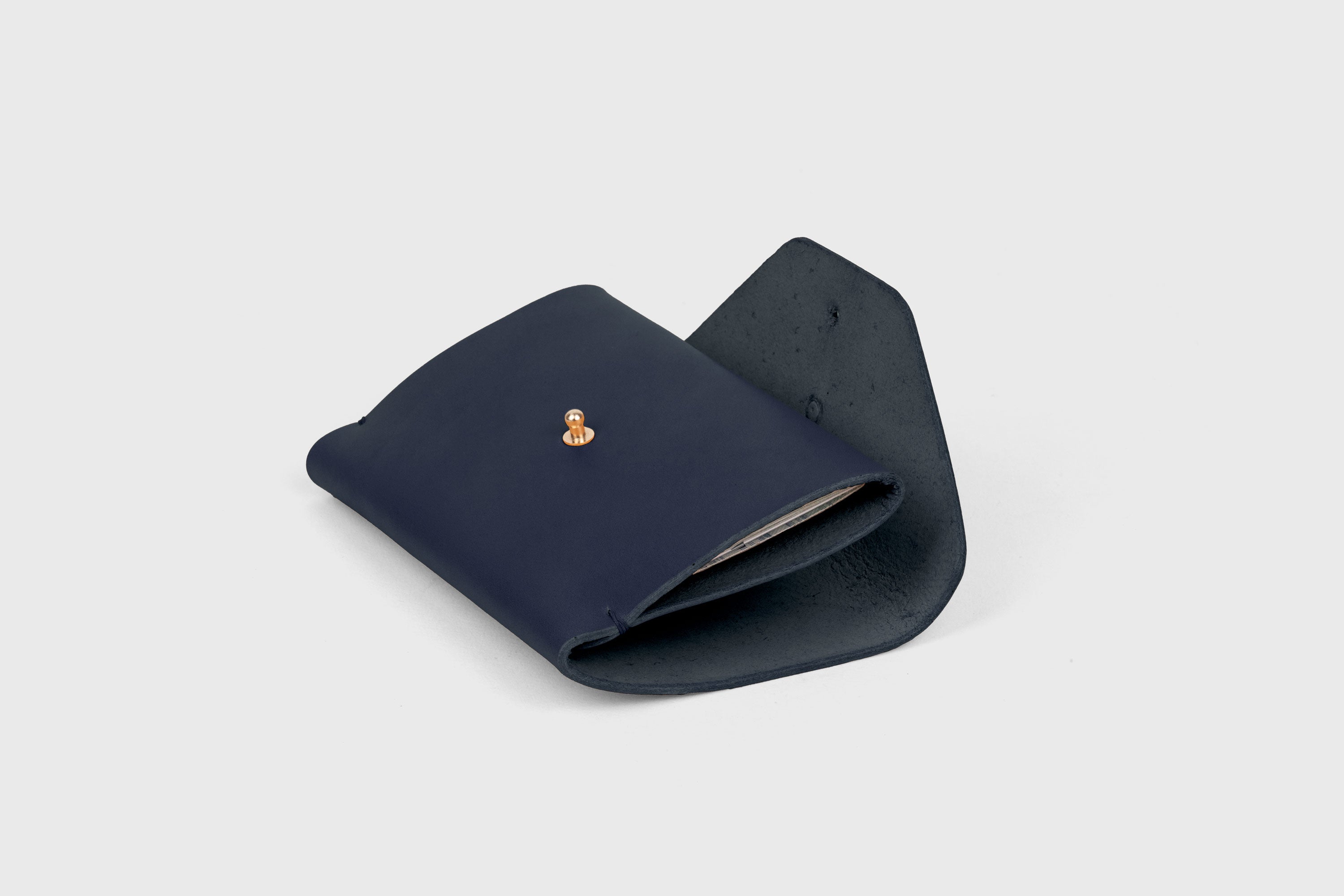 Passport Holder In Marine Blue Color In Vegetable Tanned Leather Minimalistic Design Premium Quality Atelier Madre Manuel Dreesmann Barcelona Spain