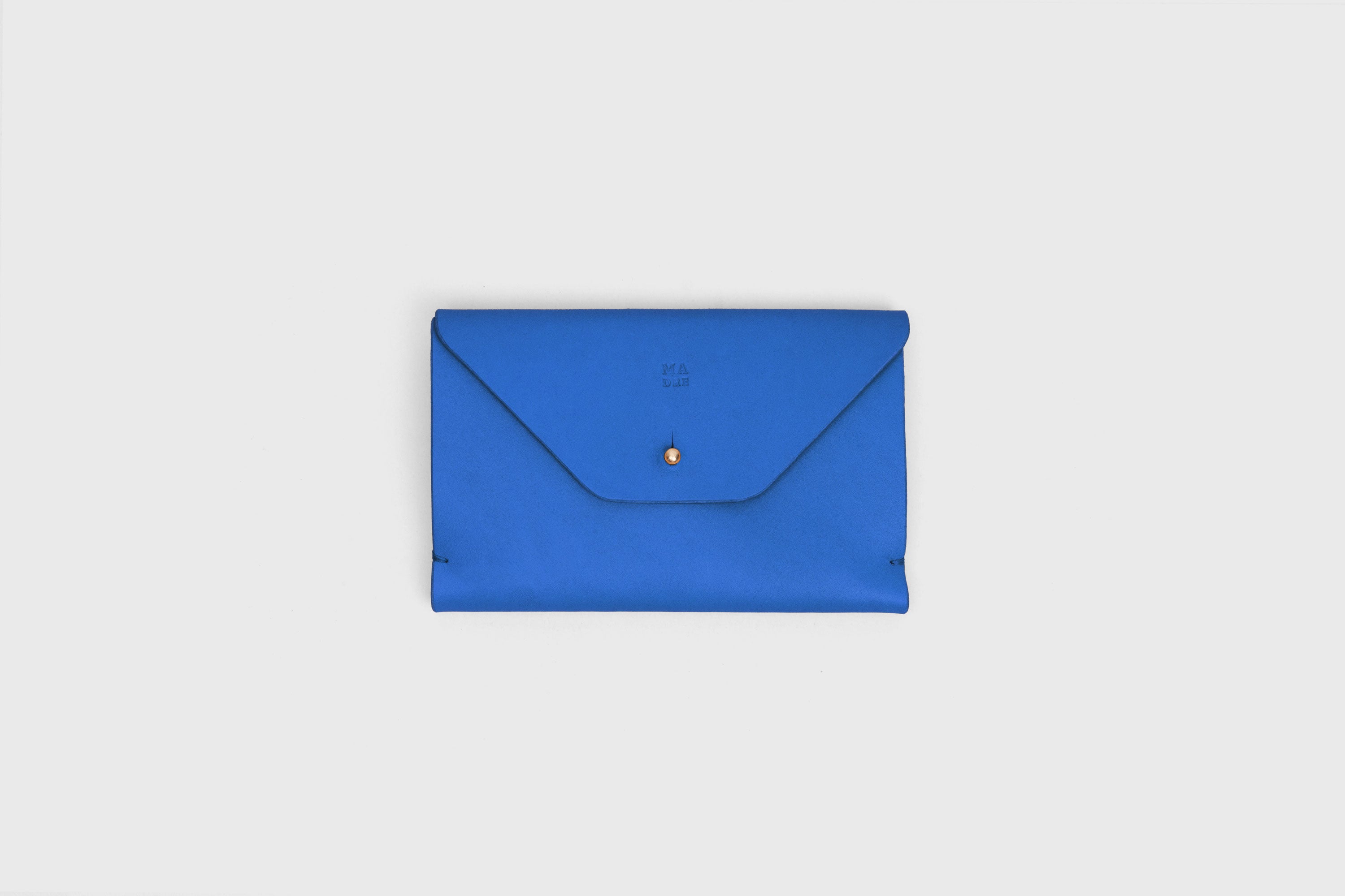 Passport Holder In Royal Blue Color In Vegetable Tanned Leather Minimalistic Design Premium Quality Atelier Madre Manuel Dreesmann Barcelona Spain