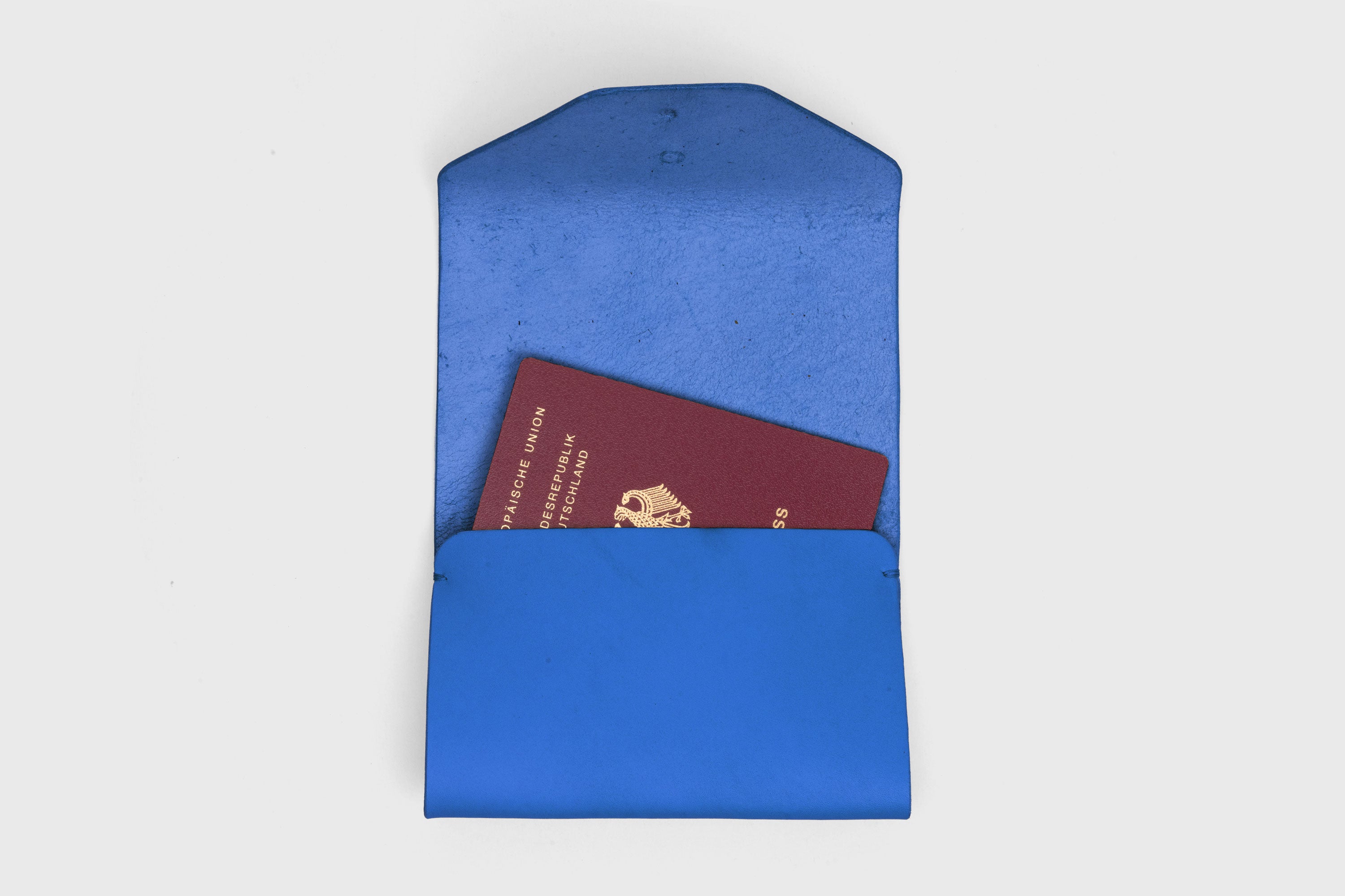 Passport Holder In Royal Blue Color In Vegetable Tanned Leather Minimalistic Design Premium Quality Atelier Madre Manuel Dreesmann Barcelona Spain