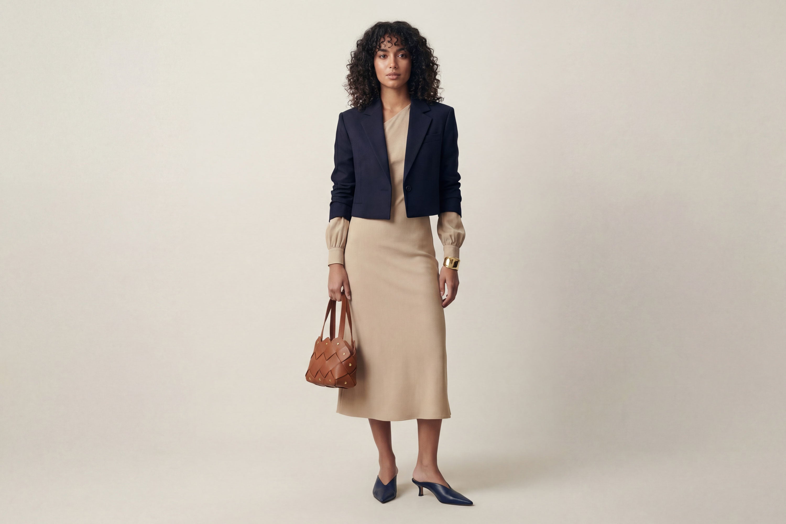 Pine Mini Tote Bag In Dark Brown Color In Vegetable Tanned Leather On Woman Model Woven Technique and Brass Rivets Atelier Madre Manuel Dreesmann Barcelona Spain