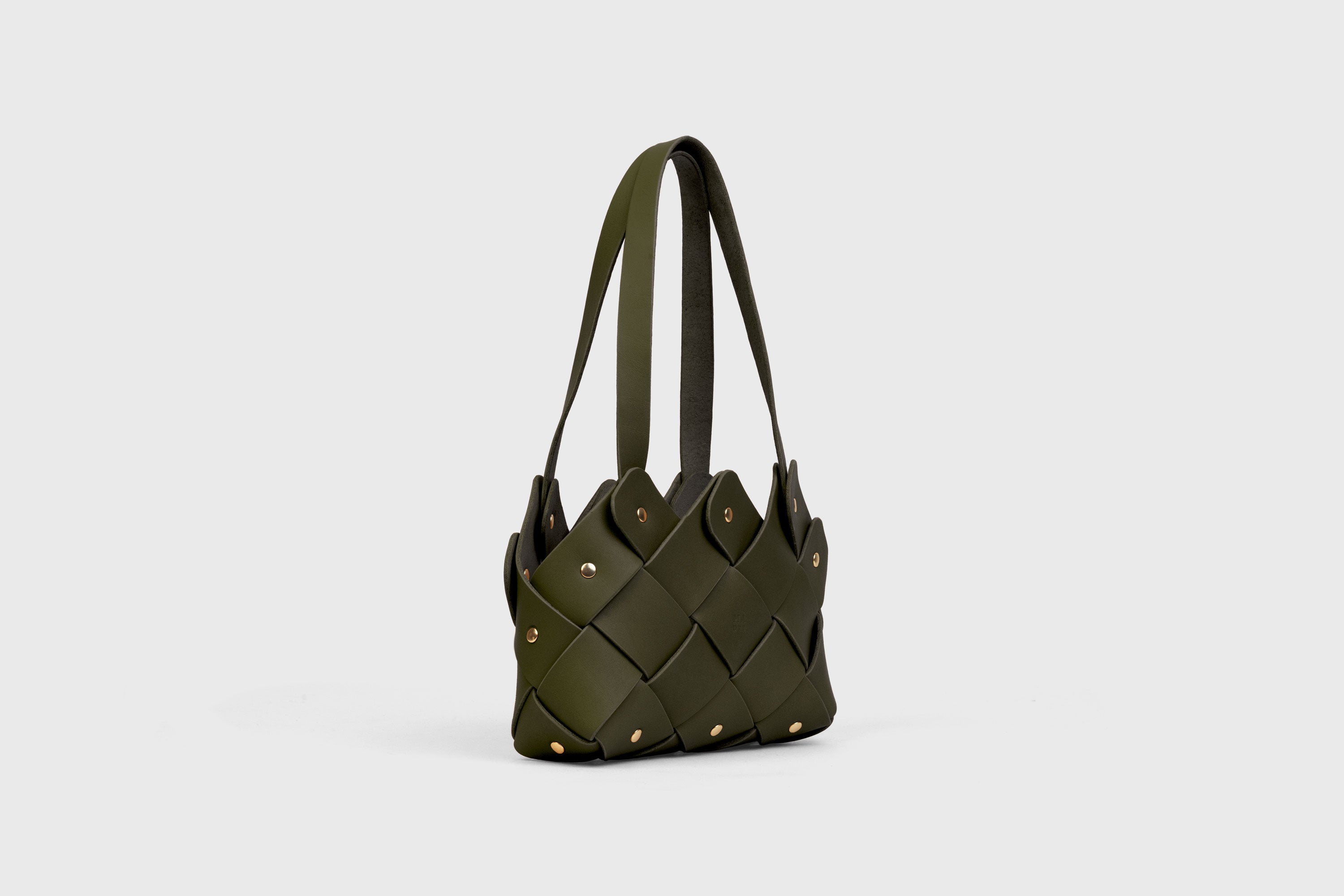 Pine Mini Tote Bag In Olive Green Color In Vegetable Tanned Leather Woven Technique and Brass Rivets Atelier Madre Manuel Dreesmann Barcelona Spain