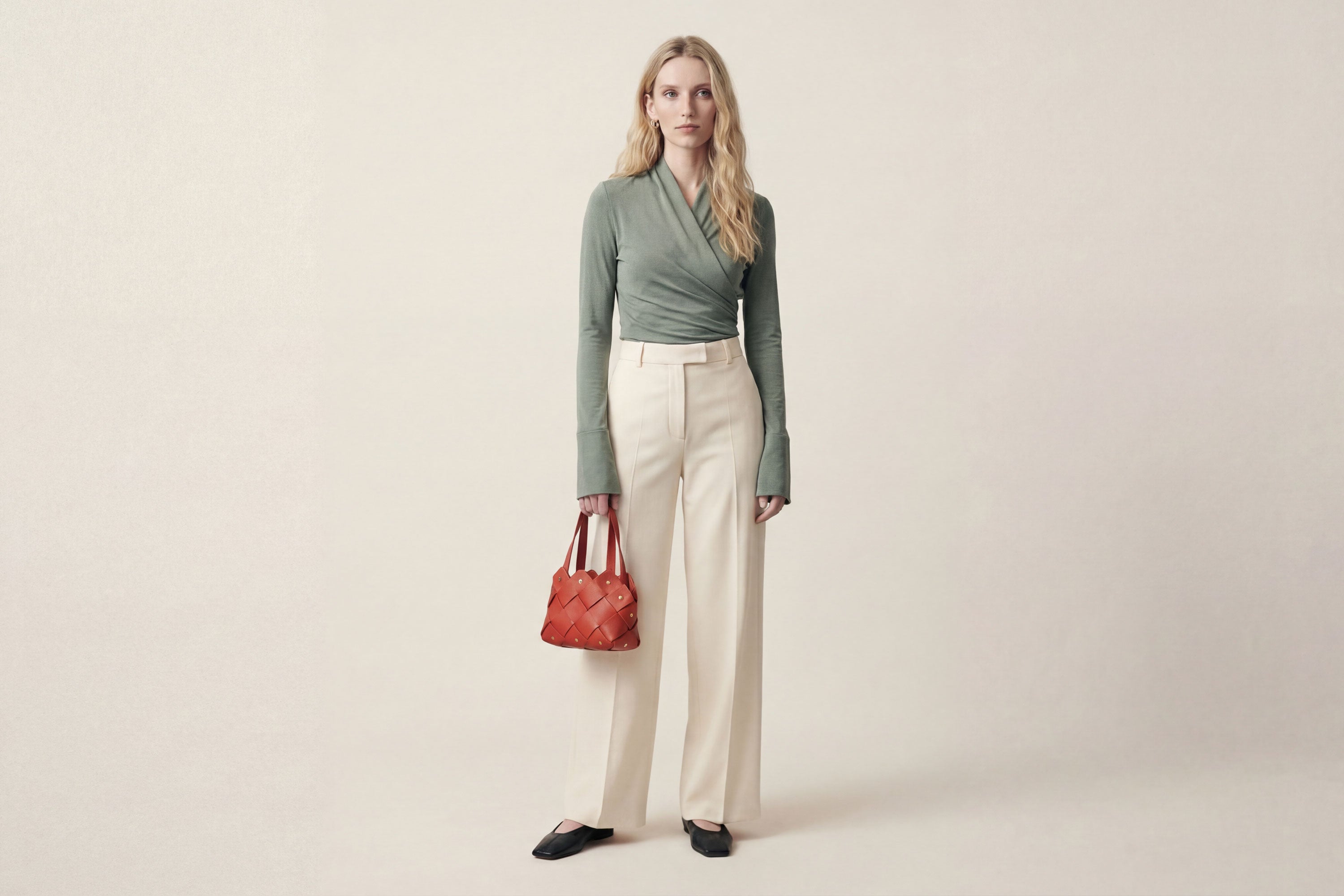 Pine Mini Tote Bag In Red Color In Vegetable Tanned Leather On Woman Model Woven Technique and Brass Rivets Atelier Madre Manuel Dreesmann Barcelona Spain