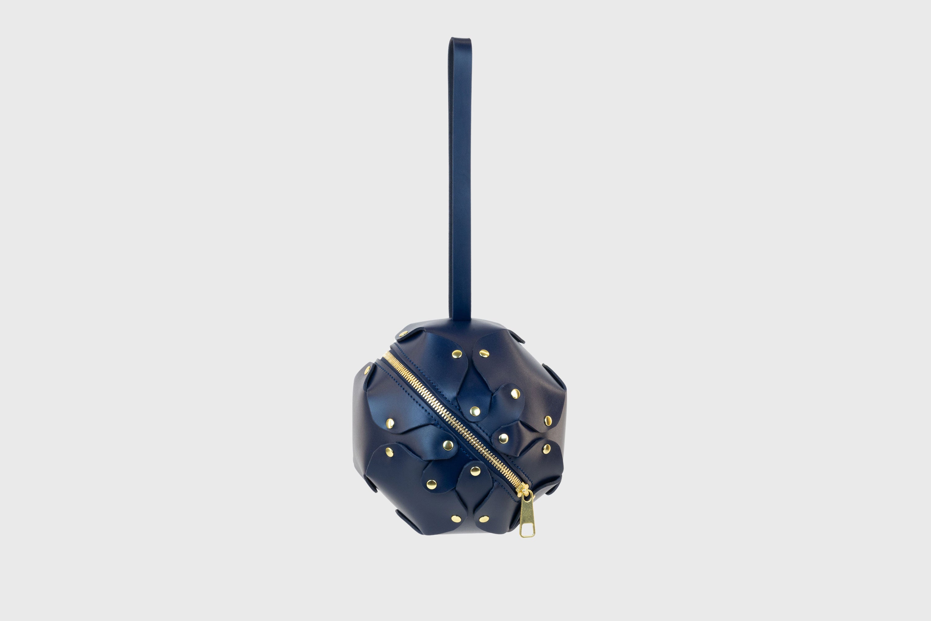 Puff Leather Ball Bag Dark Marine Blue Color Luxury Vegetable Tanned Full Grain Spain Brass Rivets Premium Design Minimalist Modern Round Sphere Circle Round Zipper Pouch Handbag Clutch Bag Atelier Madre Manuel Dreesmann Barcelona