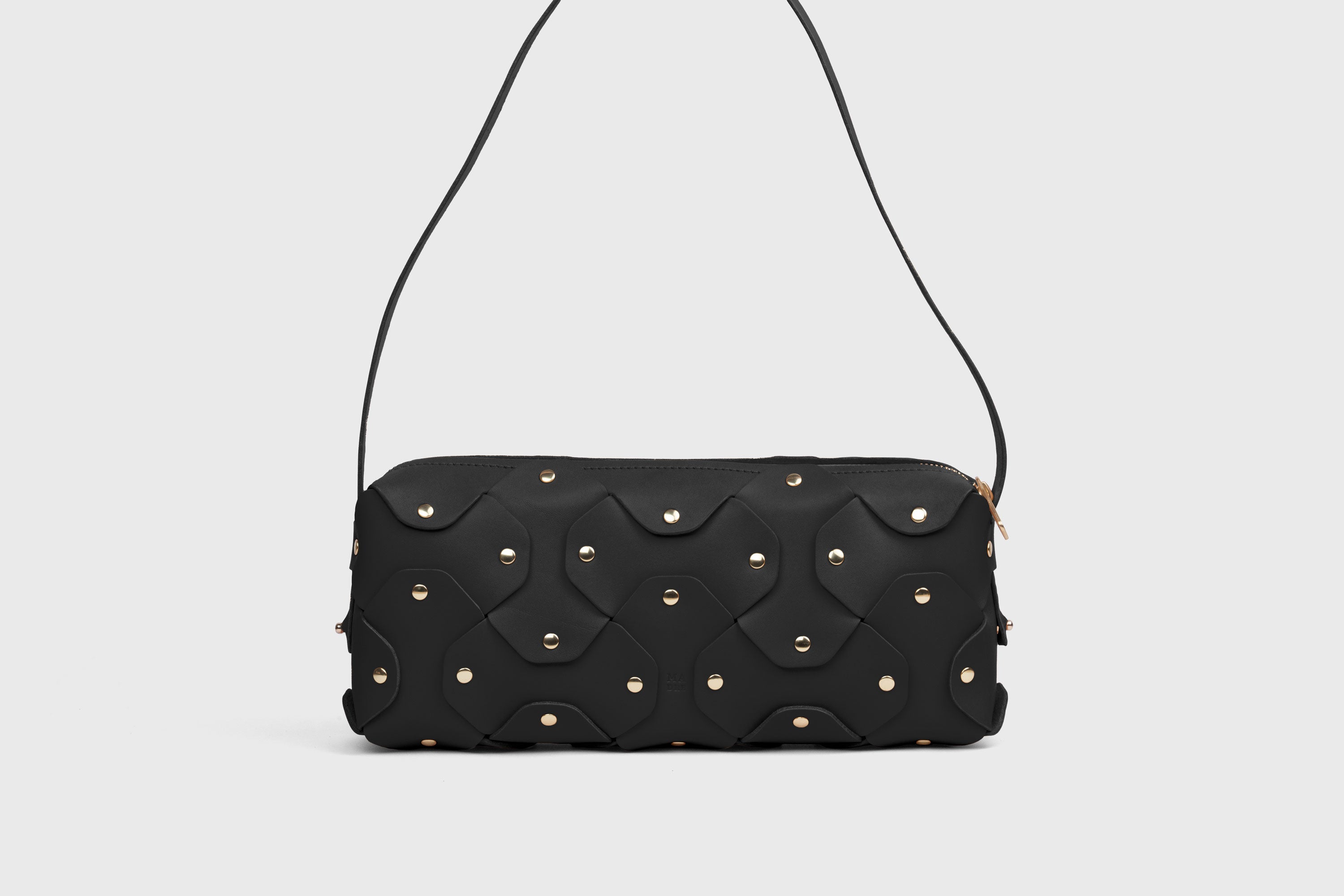 Rivet Bag 01 In Black Color In Vegetable Tanned Leather With Brass Rivets Unique Design Atelier Madre Manuel Dreesmann Barcelona Spain
