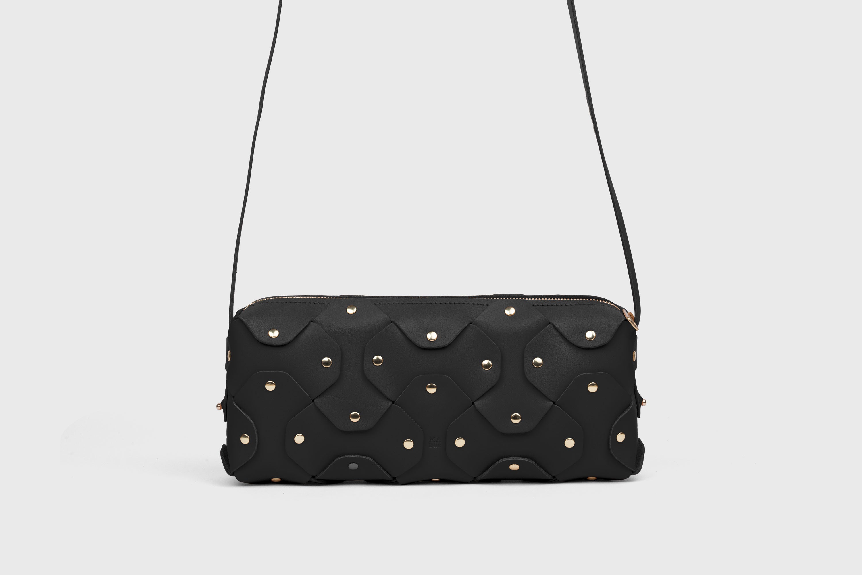 Rivet Bag 01 In Black Color In Vegetable Tanned Leather With Brass Rivets Unique Design Atelier Madre Manuel Dreesmann Barcelona Spain