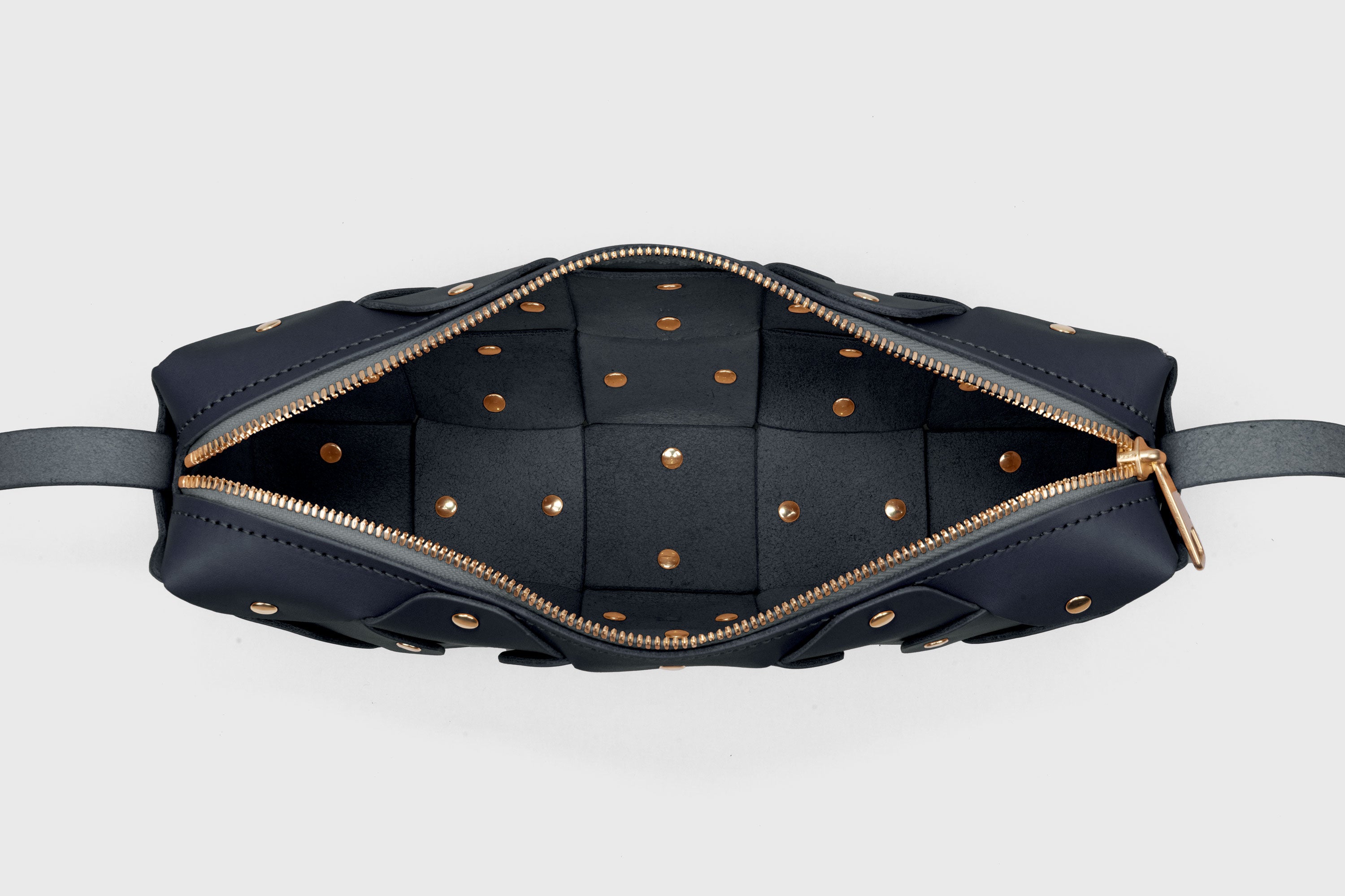 Rivet Bag 01 In Marine Blue Color In Vegetable Tanned Leather With Brass Rivets Unique Design Atelier Madre Manuel Dreesmann Barcelona Spain