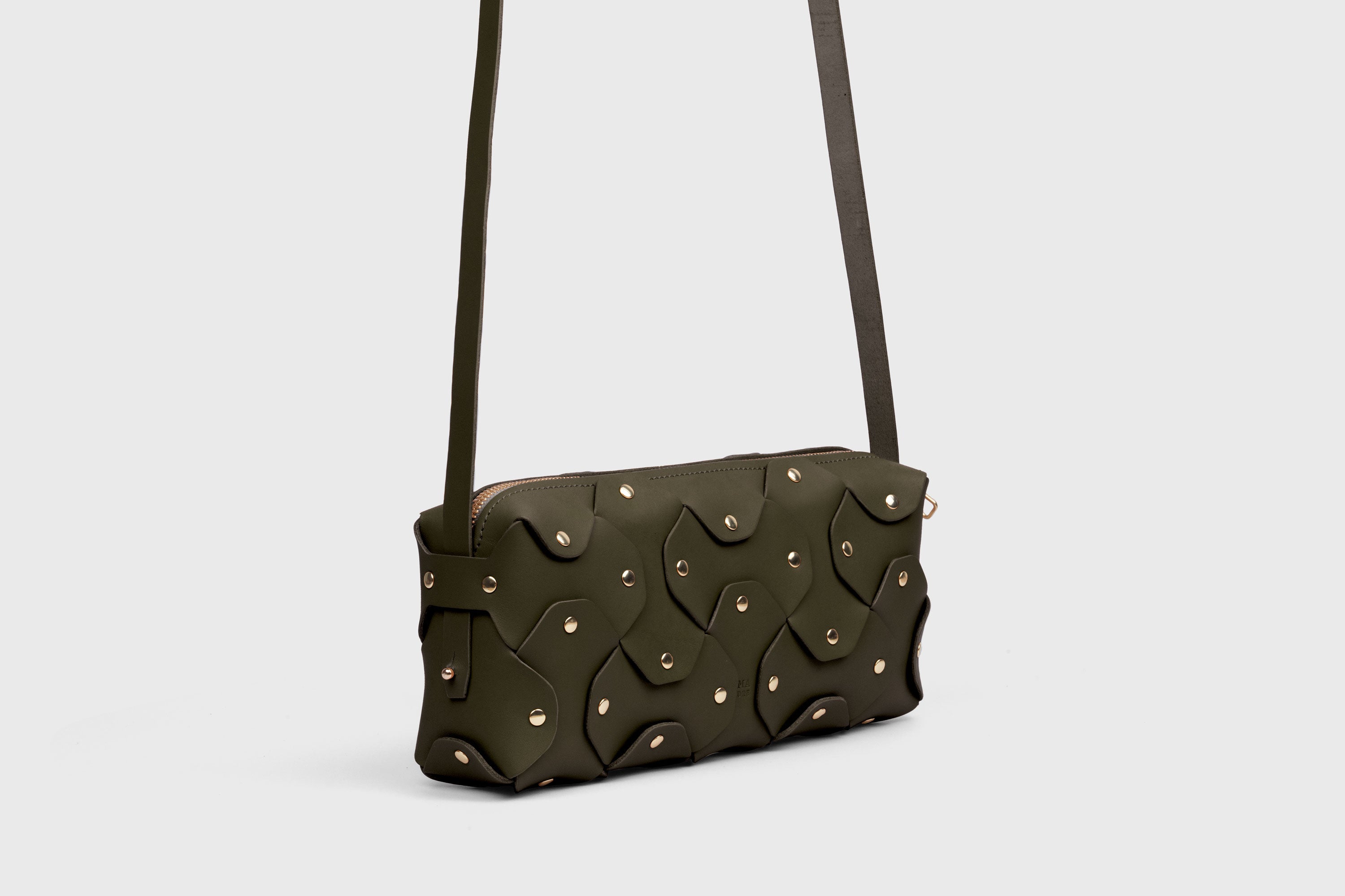 Rivet Bag 01 In Olive Green Color In Vegetable Tanned Leather With Brass Rivets Unique Design Atelier Madre Manuel Dreesmann Barcelona Spain