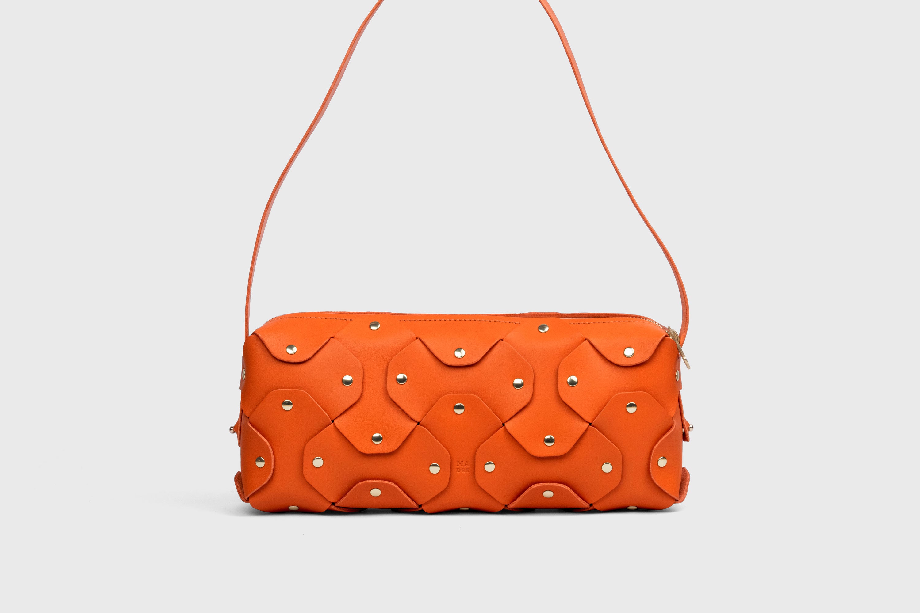 Rivet Bag 01 In Orange Color In Vegetable Tanned Leather With Brass Rivets Unique Design Atelier Madre Manuel Dreesmann Barcelona Spain