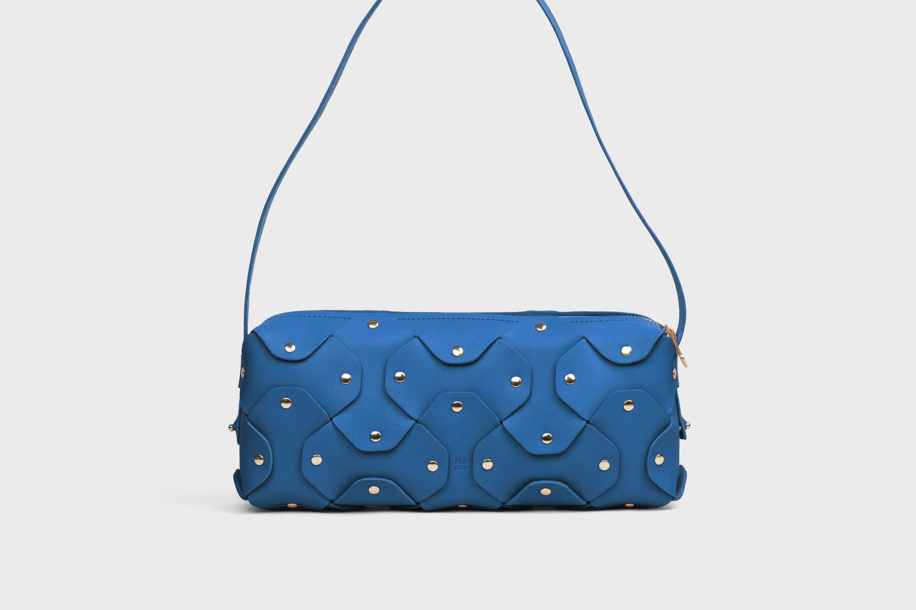 Rivet Bag 01 In Royal Blue Color In Vegetable Tanned Leather With Brass Rivets Unique Design Atelier Madre Manuel Dreesmann Barcelona Spain
