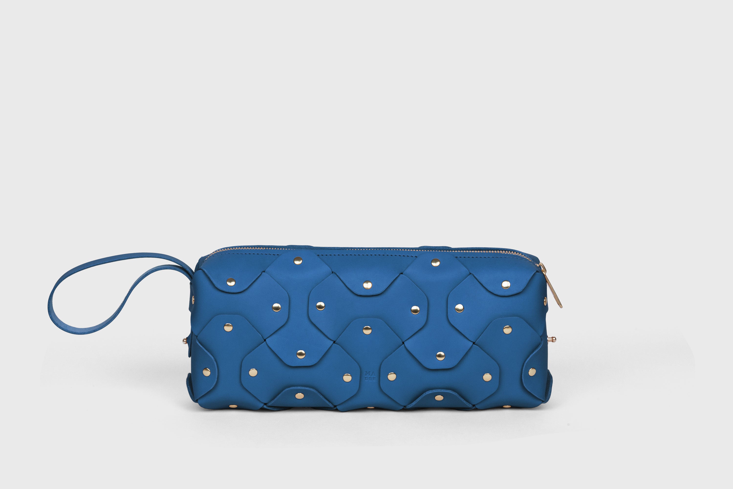 Rivet Bag 01 In Royal Blue Color In Vegetable Tanned Leather With Brass Rivets Unique Design Atelier Madre Manuel Dreesmann Barcelona Spain