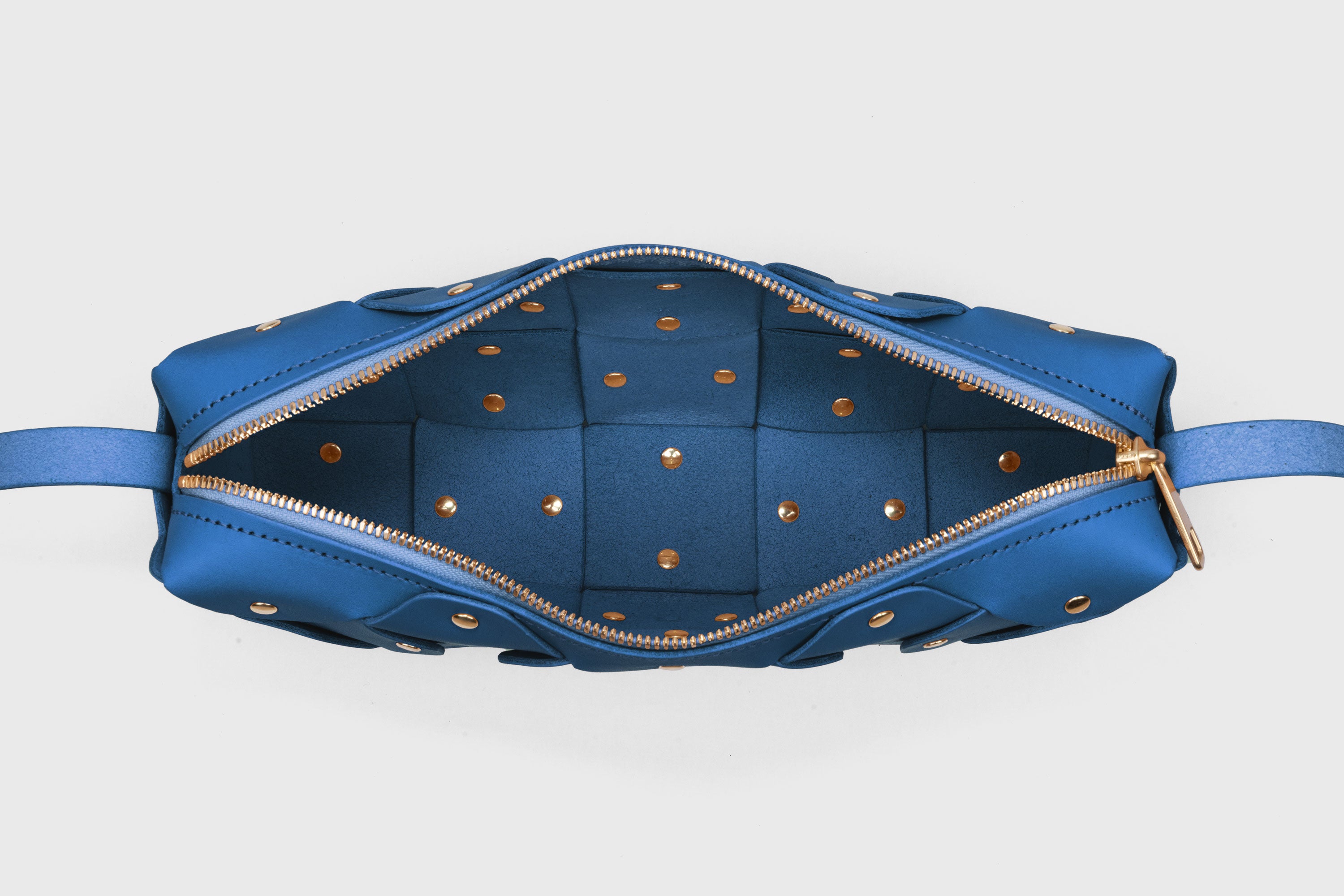Rivet Bag 01 In Royal Blue Color In Vegetable Tanned Leather With Brass Rivets Unique Design Atelier Madre Manuel Dreesmann Barcelona Spain