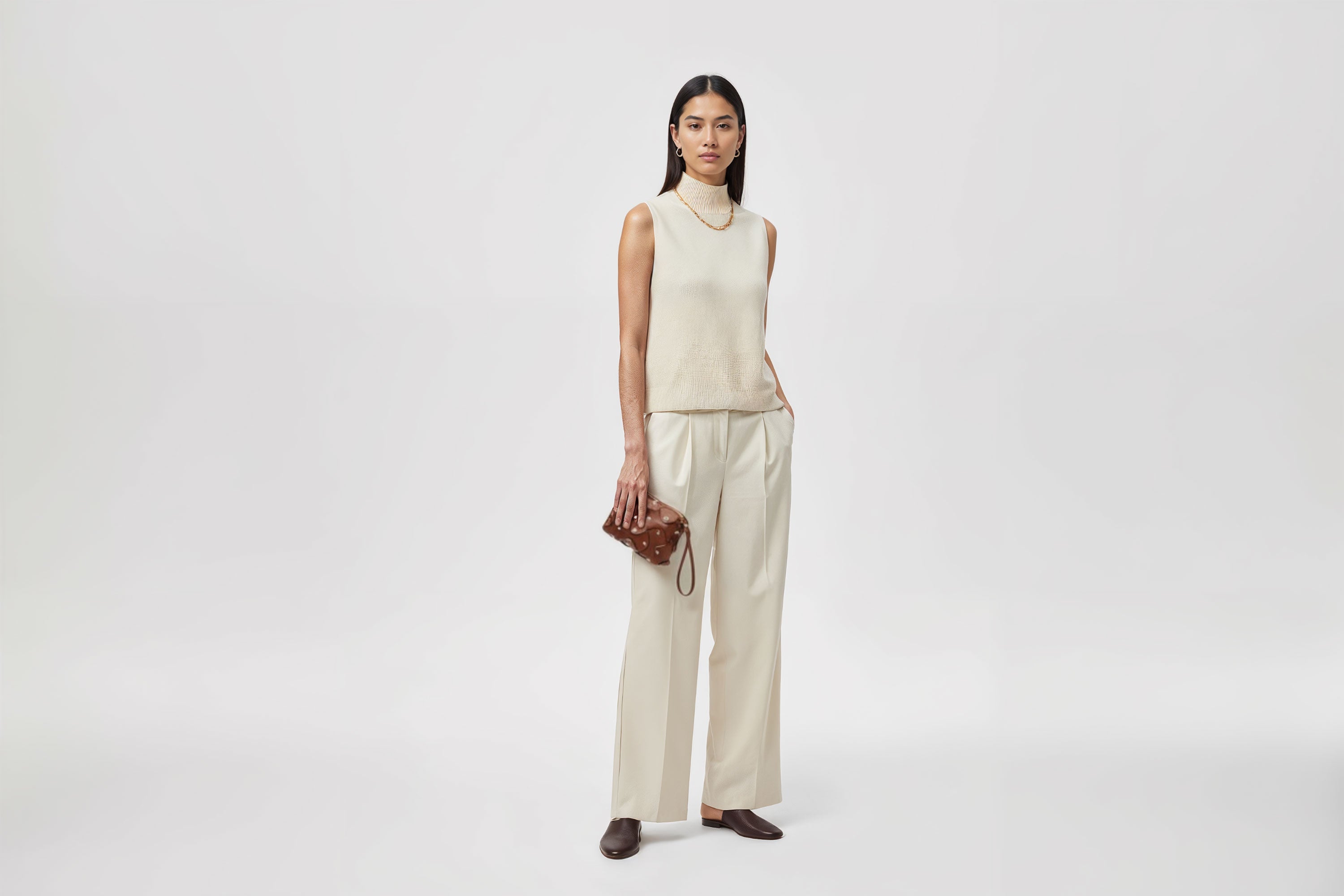 Rivet Bag Small Leather Dark Brown Color Clutch On Model Crossbody Shoulder Detachable Full Brass Vegetable Tanned Full Grain Leather High Quality Modern Minimalistic Design Atelier Madre Manuel Dreesmann Barcelona Spain