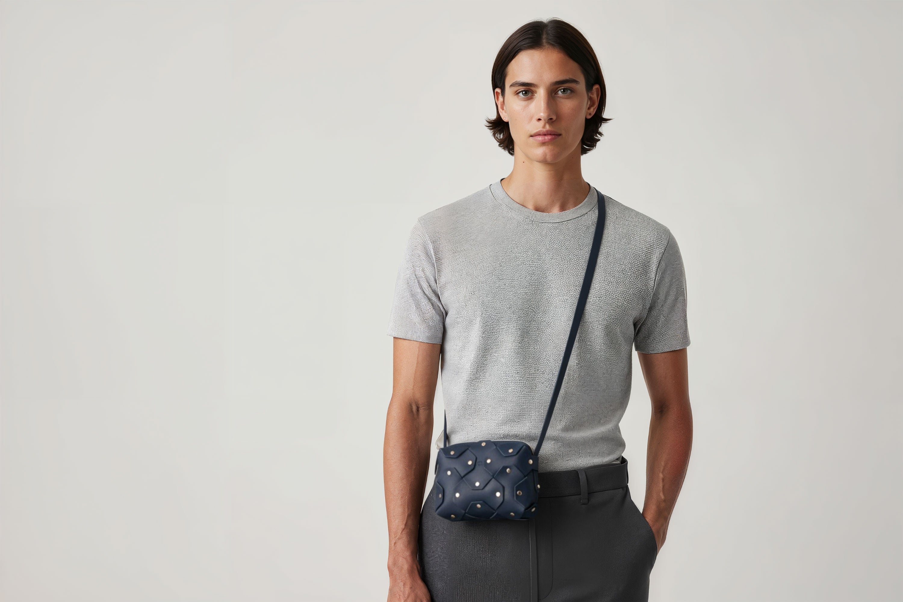 Rivet Bag Small Leather Marine Blue Color Clutch On Model Crossbody Shoulder Detachable Full Brass Vegetable Tanned Full Grain Leather High Quality Modern Minimalistic Design Atelier Madre Manuel Dreesmann Barcelona Spain
