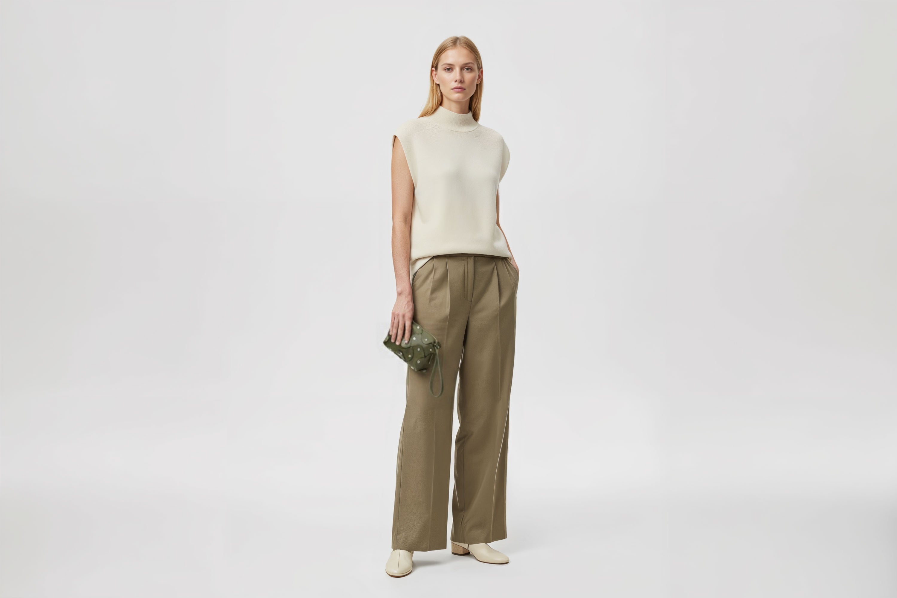 Rivet Bag Small Leather Olive Green Color Clutch Olive Green On Model Crossbody Shoulder Detachable Full Brass Vegetable Tanned Full Grain Leather High Quality Modern Minimalistic Design Atelier Madre Manuel Dreesmann Barcelona Spain