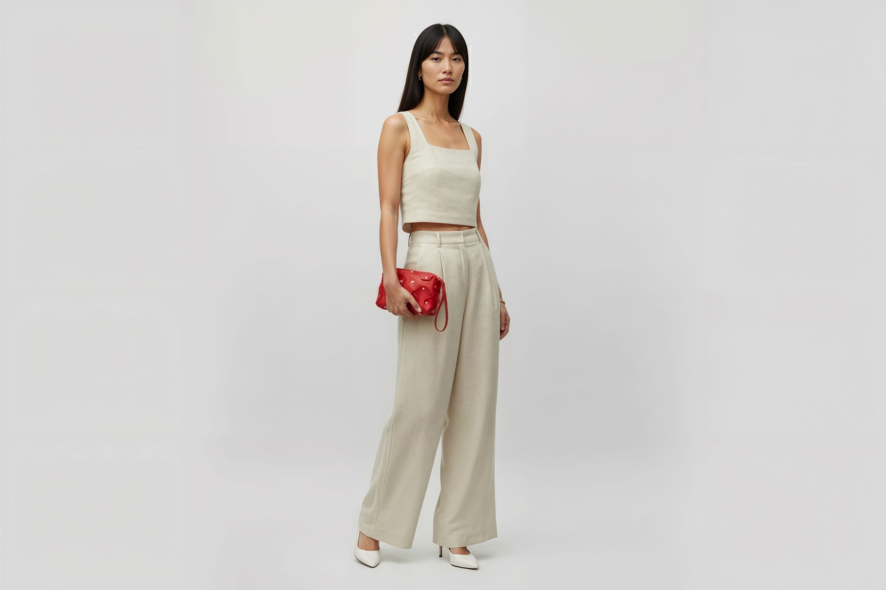 Rivet Bag Small Leather Red Color Clutch Crossbody On Model Shoulder Detachable Full Brass Vegetable Tanned Full Grain Leather High Quality Modern Minimalistic Design Atelier Madre Manuel Dreesmann Barcelona Spain