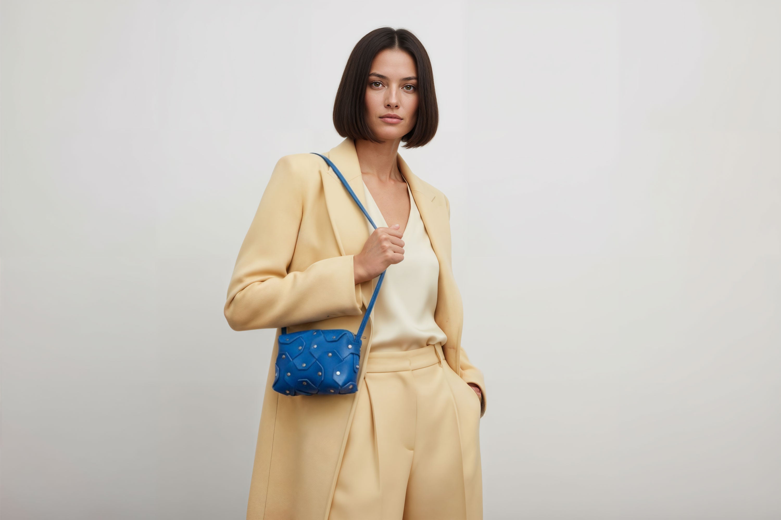 Rivet Bag Small Leather Royal Blue Color On Model Clutch Crossbody Shoulder Detachable Full Brass Vegetable Tanned Full Grain Leather High Quality Modern Minimalistic Design Atelier Madre Manuel Dreesmann Barcelona Spain