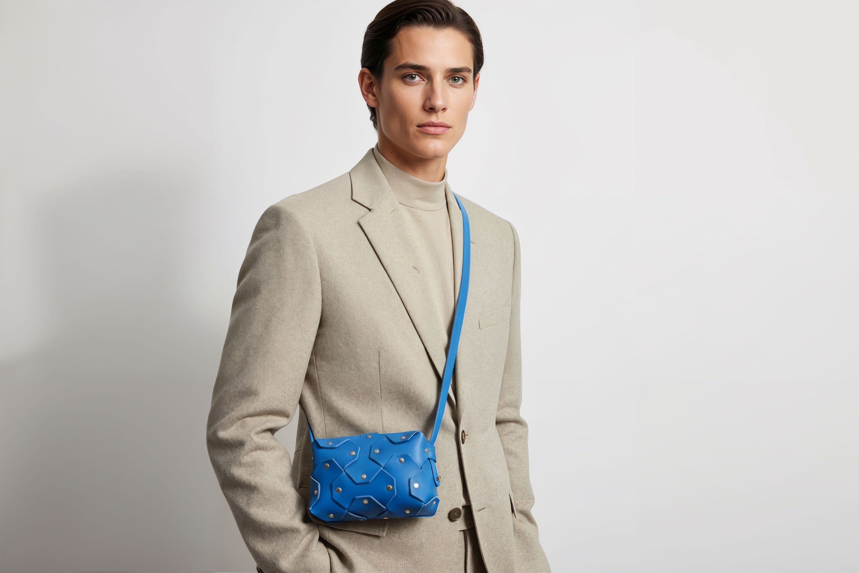 Rivet Bag Small Leather Royal Blue Color On Model Clutch Crossbody Shoulder Detachable Full Brass Vegetable Tanned Full Grain Leather High Quality Modern Minimalistic Design Atelier Madre Manuel Dreesmann Barcelona Spain