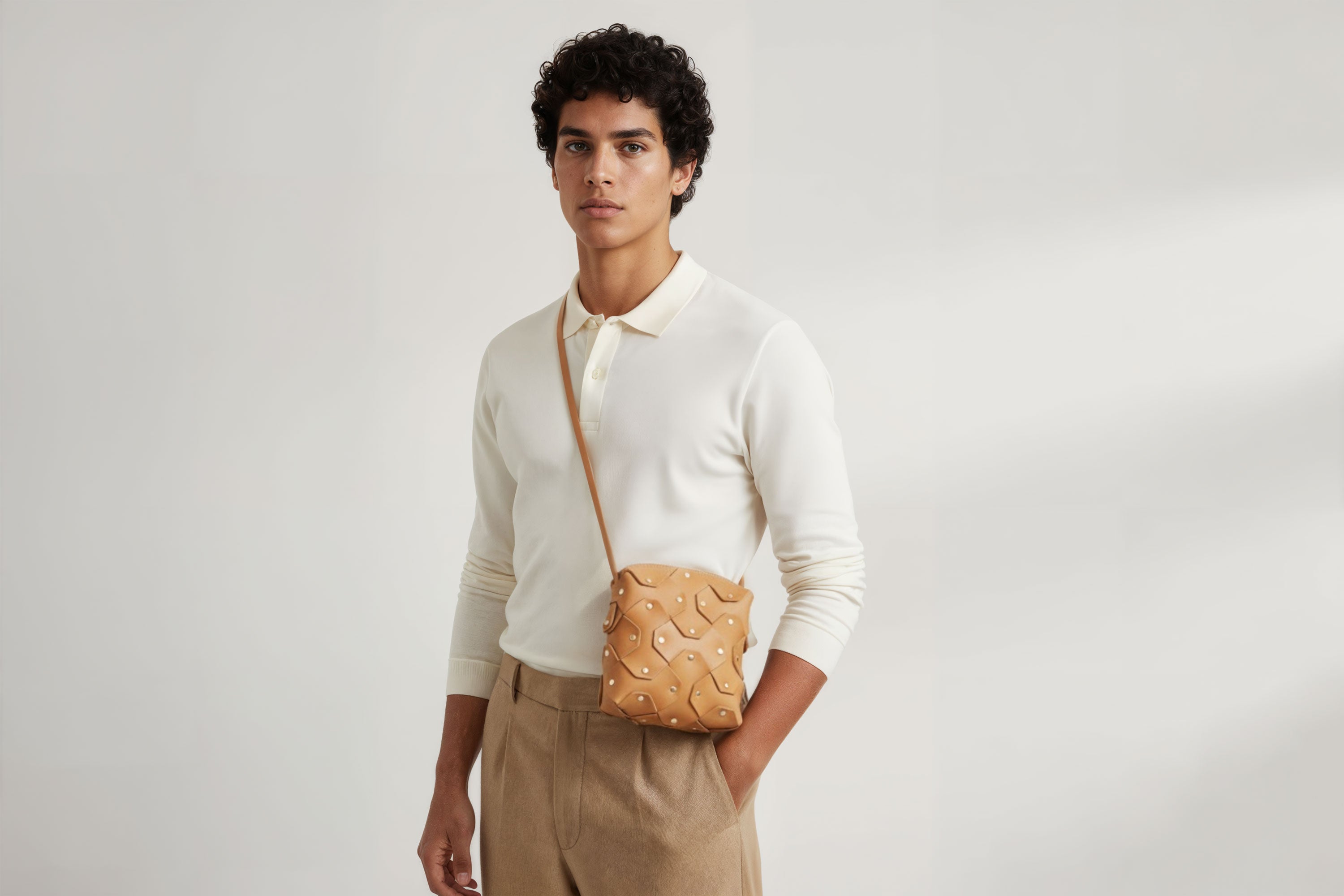 Rivet Bag Squared Brown Color Leather On a Man Model Bag Minimalist Modern Design Premium Quality Atelier Madre Manuel Dreesmann Barcelona