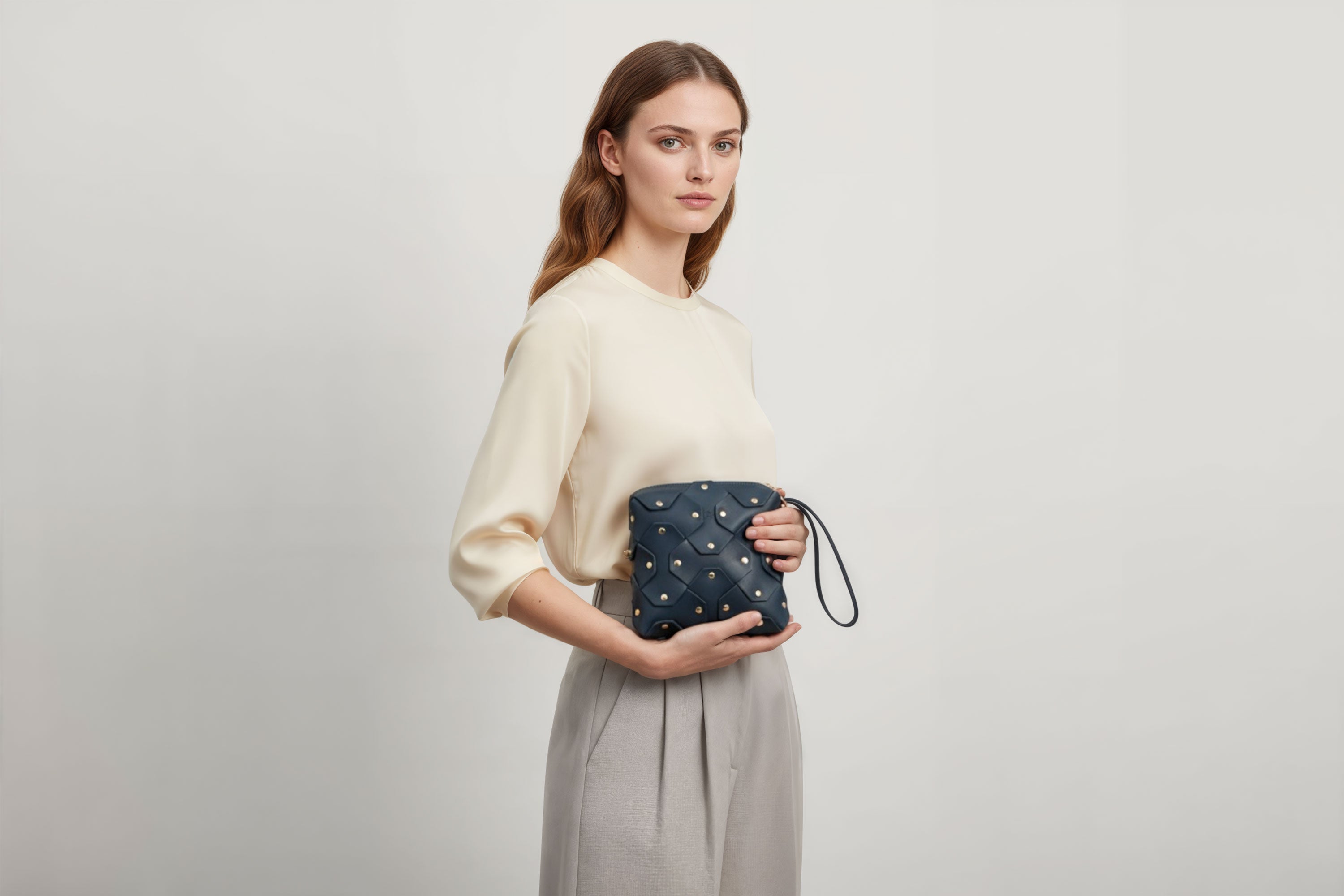 Rivet Bag Squared Marine Blue Colour Leather Bag On A Woman Model Minimalist Modern Design Premium Quality Atelier Madre Manuel Dreesmann Barcelona