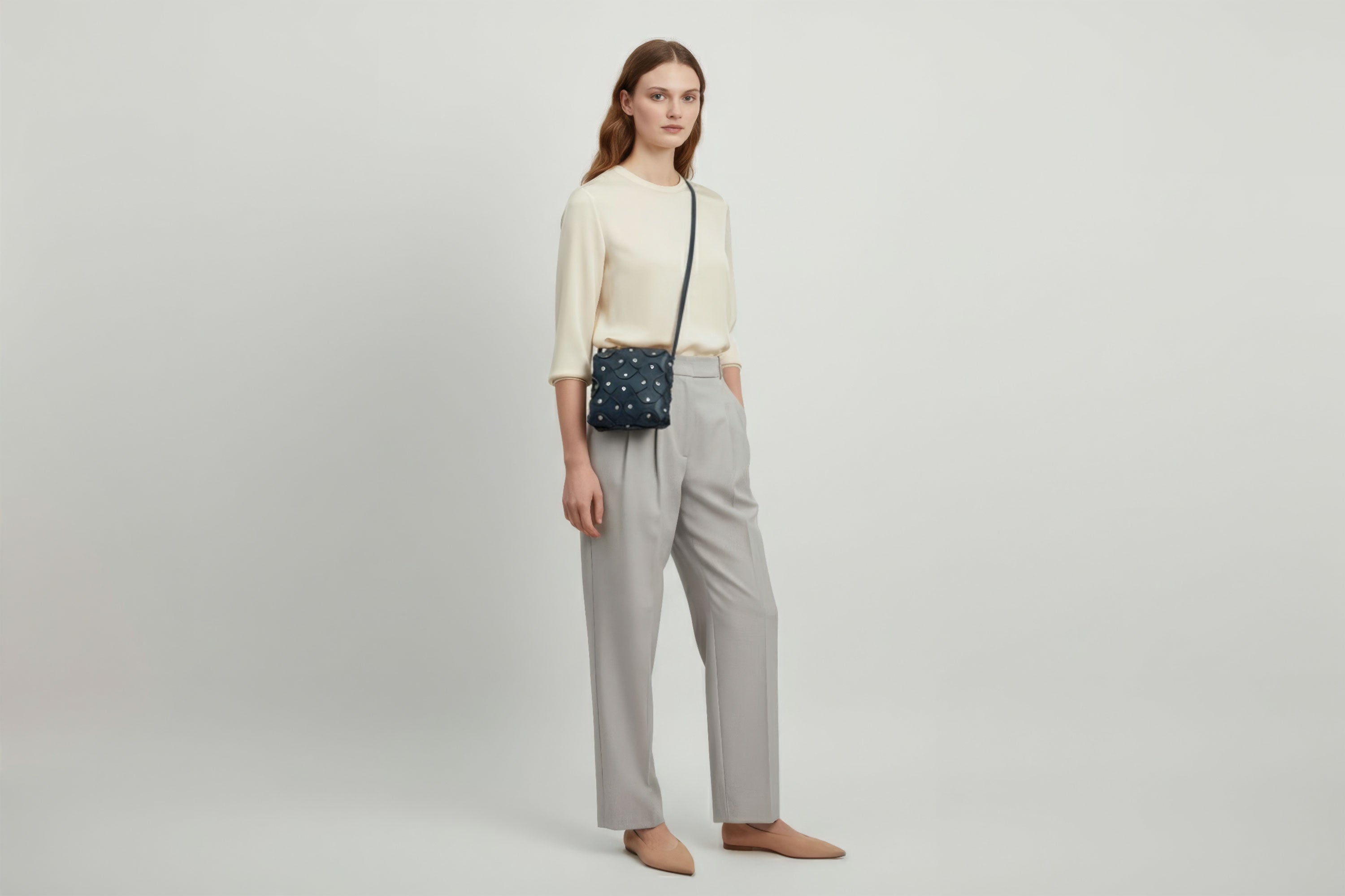 Rivet Bag Squared Marine Blue Colour Leather Bag On A Woman Model Minimalist Modern Design Premium Quality Atelier Madre Manuel Dreesmann Barcelona