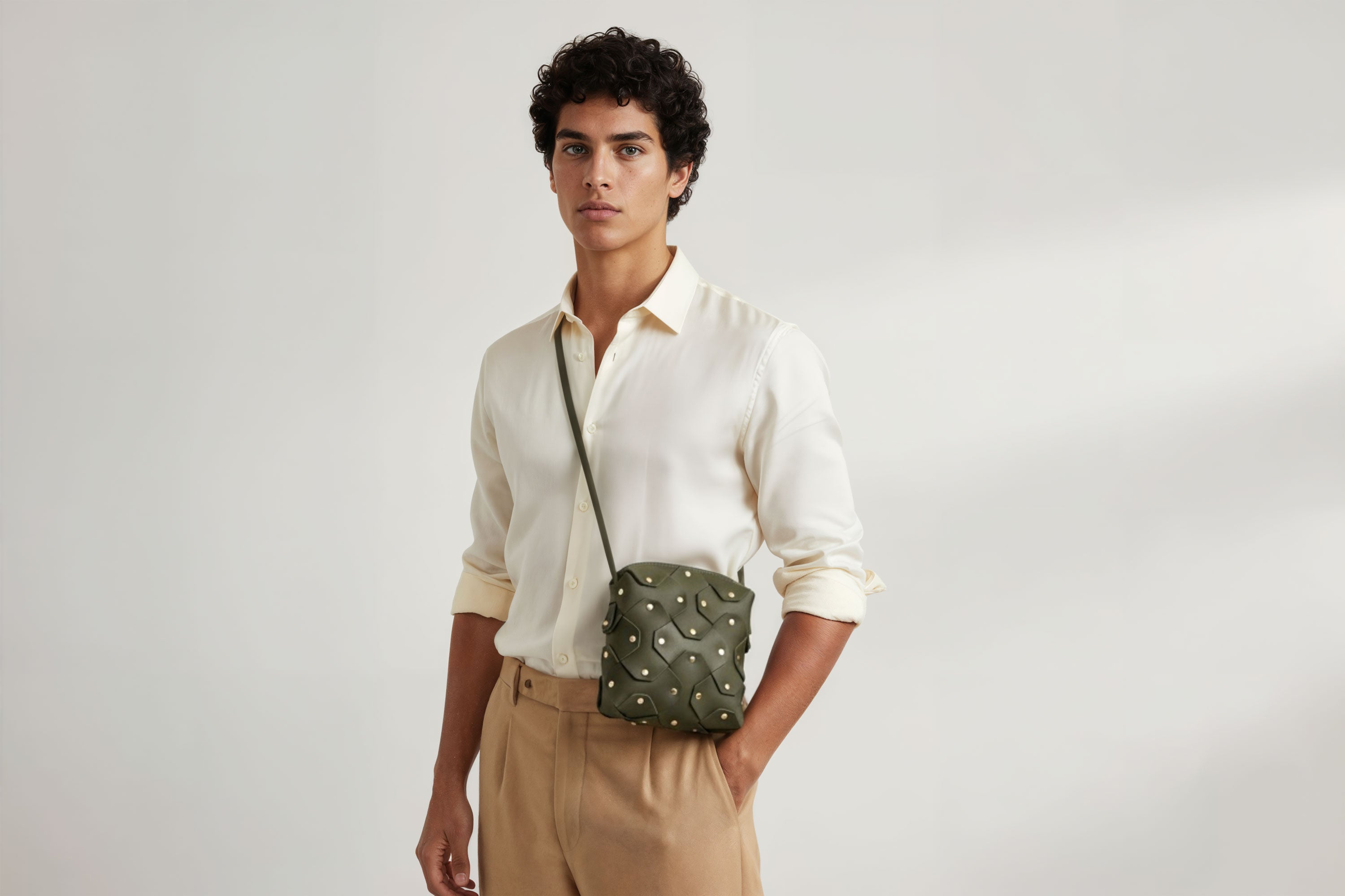 Rivet Bag Squared Olive Green Colour Leather Bag On A Man Model Minimalist Modern Design Premium Quality Atelier Madre Manuel Dreesmann Barcelona