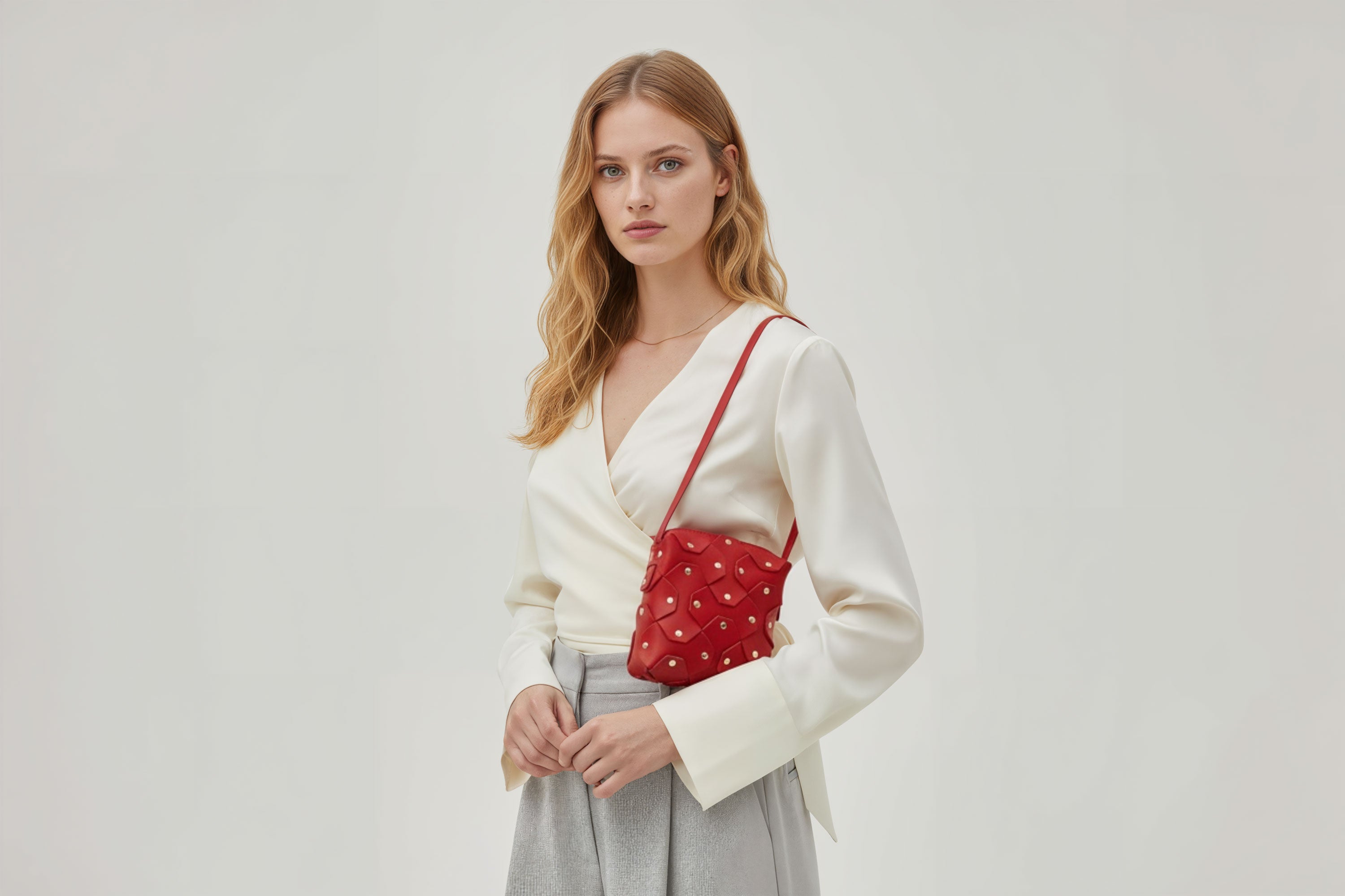 Rivet Bag Squared Red Colour Leather Bag On A Woman Model Minimalist Modern Design Premium Quality Atelier Madre Manuel Dreesmann Barcelona