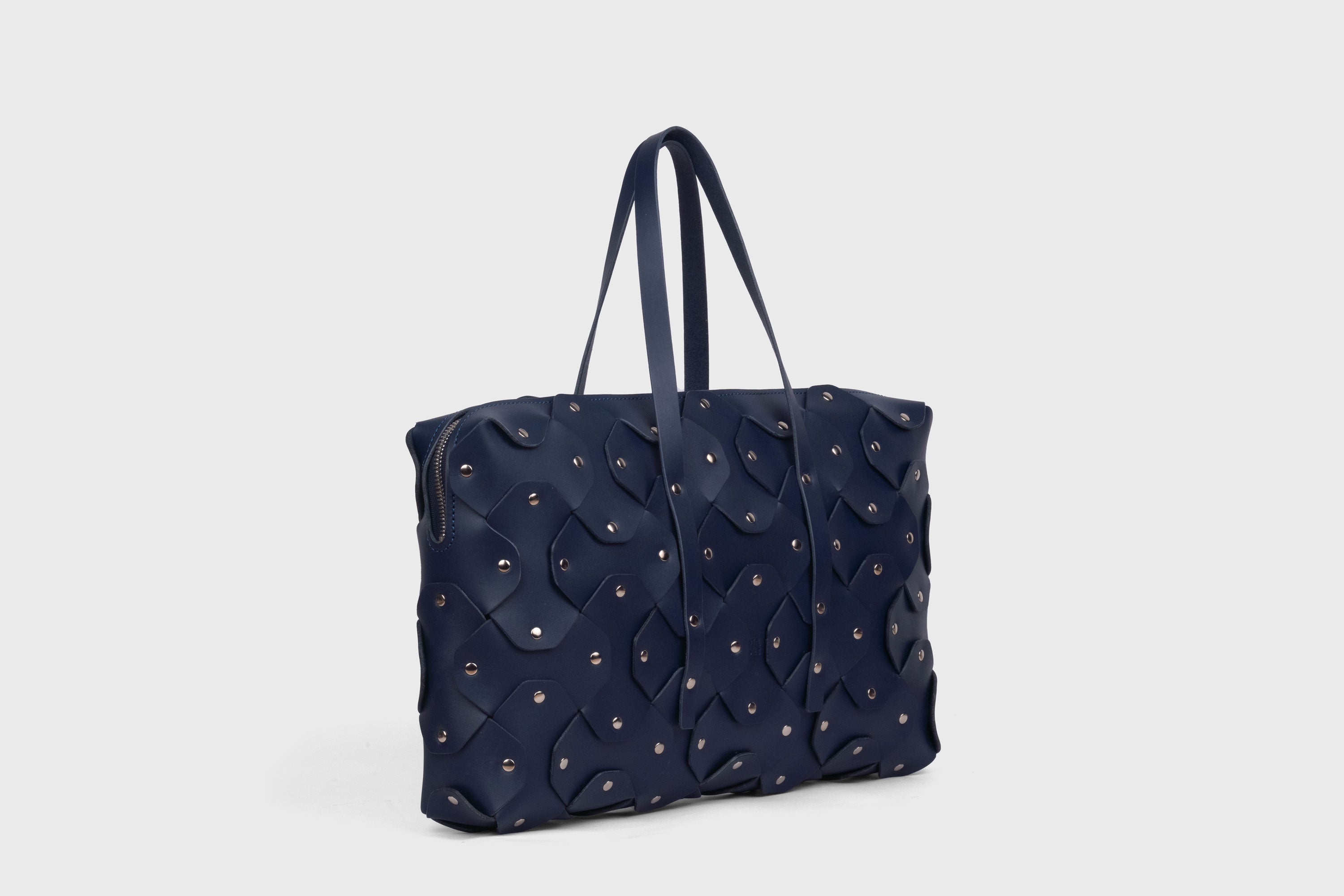 Rivet Briefcase In Marine Blue Color In Vegetable Tanned Leather With Brass Rivets Unique Design Atelier Madre Manuel Dreesmann Barcelona Spain