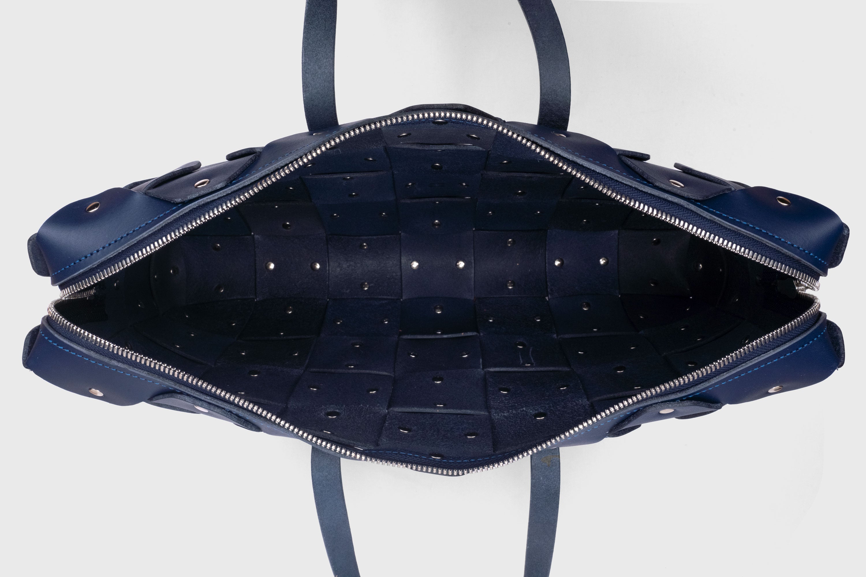 Rivet Briefcase In Marine Blue Color In Vegetable Tanned Leather With Brass Rivets Unique Design Atelier Madre Manuel Dreesmann Barcelona Spain