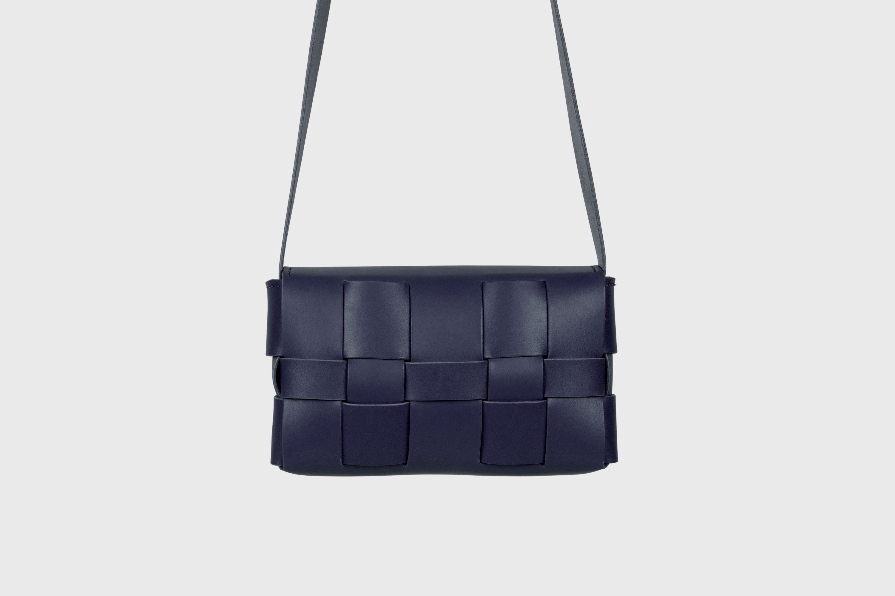 Saka Bag Regular In Marine Blue Color In Vegetable Tanned Full Grain Leather Woven Structure Design Atelier Madre Manuel Dreesmann Barcelona Spain