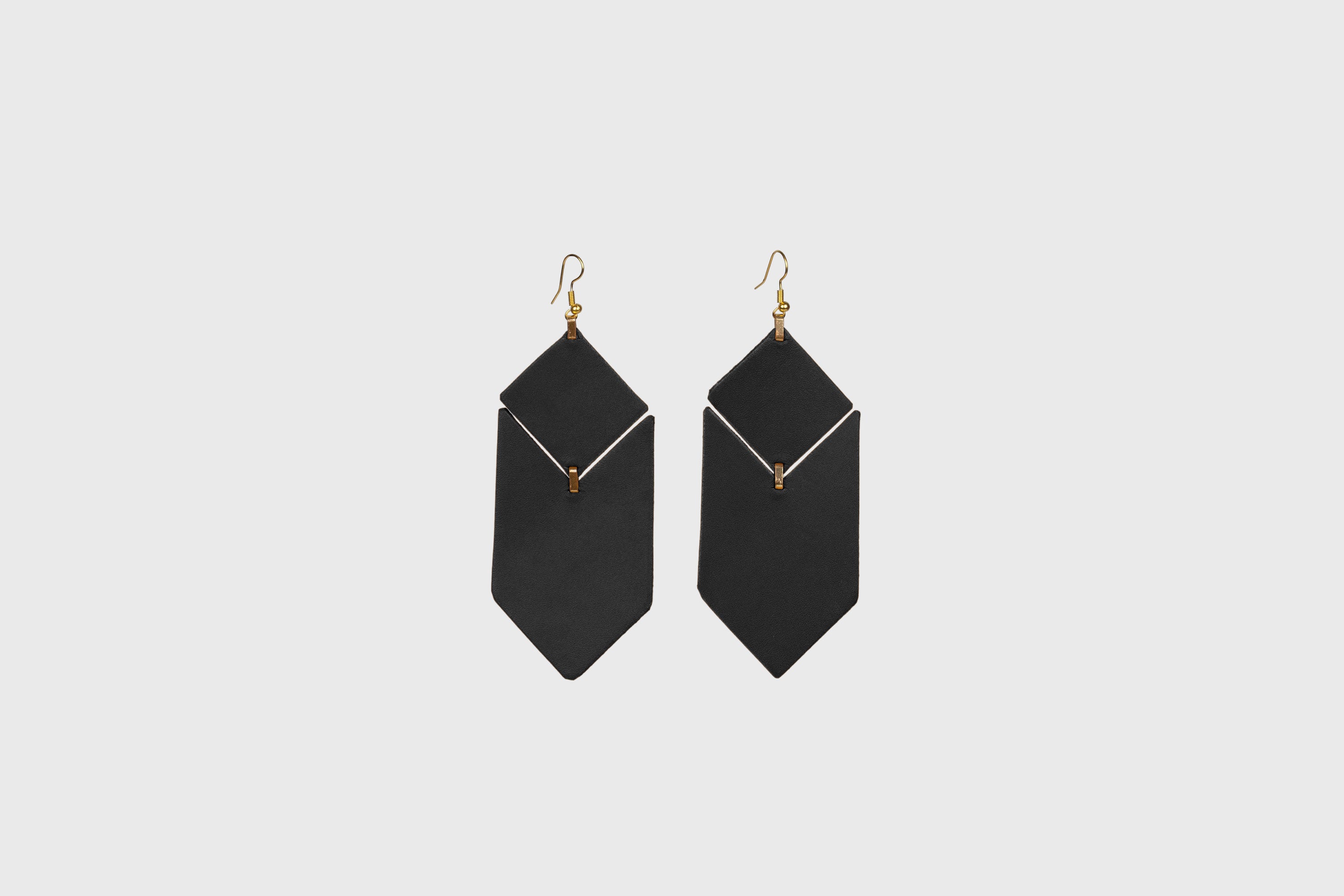 Tess Earrings Leather In Black Color Vegetable Tanned Leather Minimalistic Design Atelier Madre Manuel Dreesmann Barcelona Spain