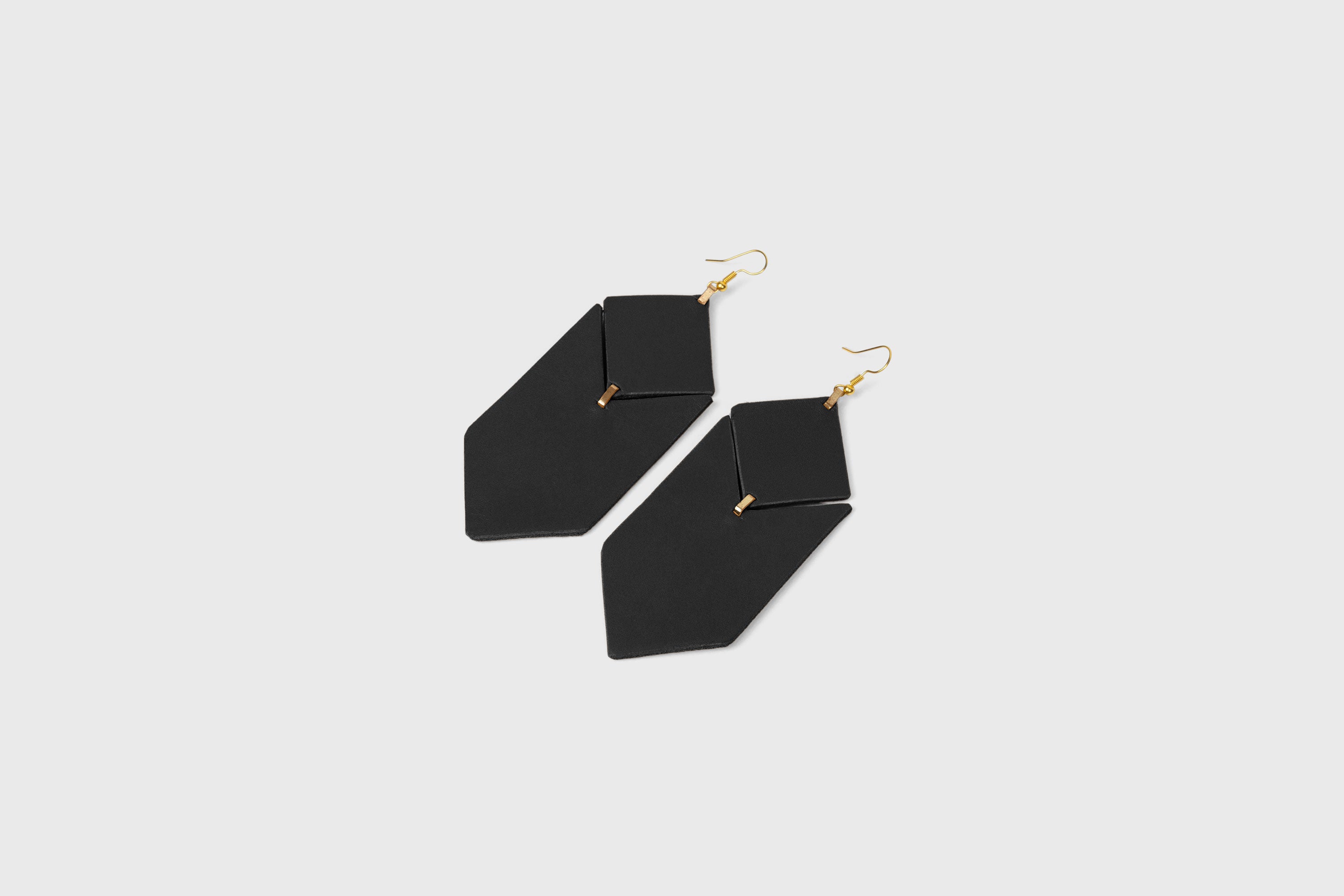 Tess Earrings Leather In Black Color Vegetable Tanned Leather Minimalistic Design Atelier Madre Manuel Dreesmann Barcelona Spain